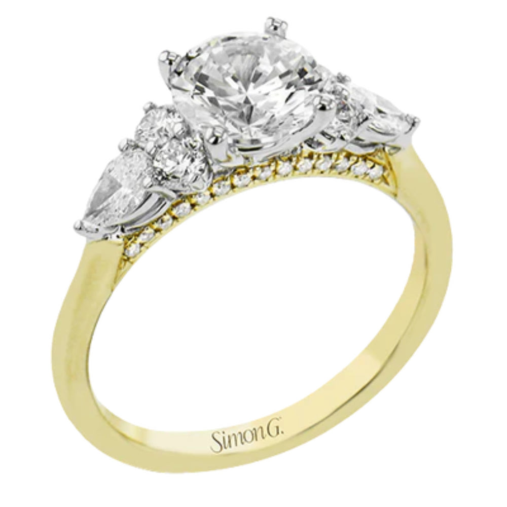 An 18k two-tone gold engagement ring with a central white diamond and two pear diamonds on either side, with a total diamond weight of 0.66 carats.
