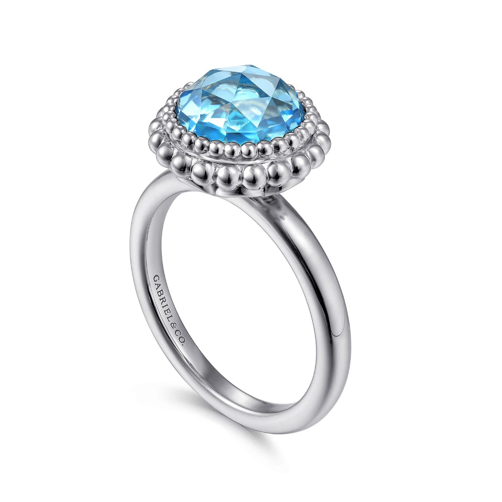 Sterling Silver ring with a blue topaz