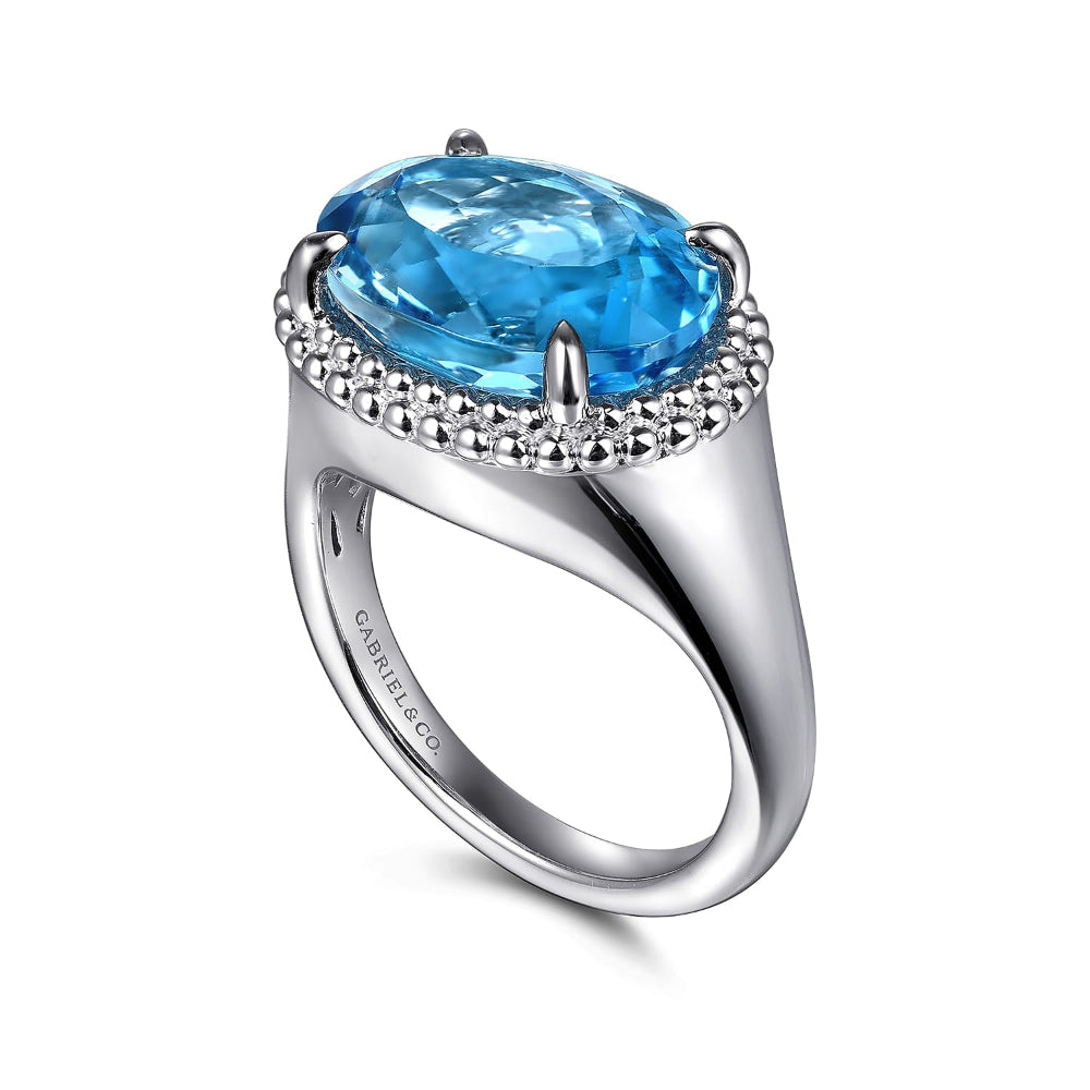 Sterling Silver ring with a blue topaz 