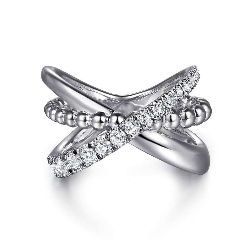 Silver ring with White Sapphire accents in a criss cross style 
