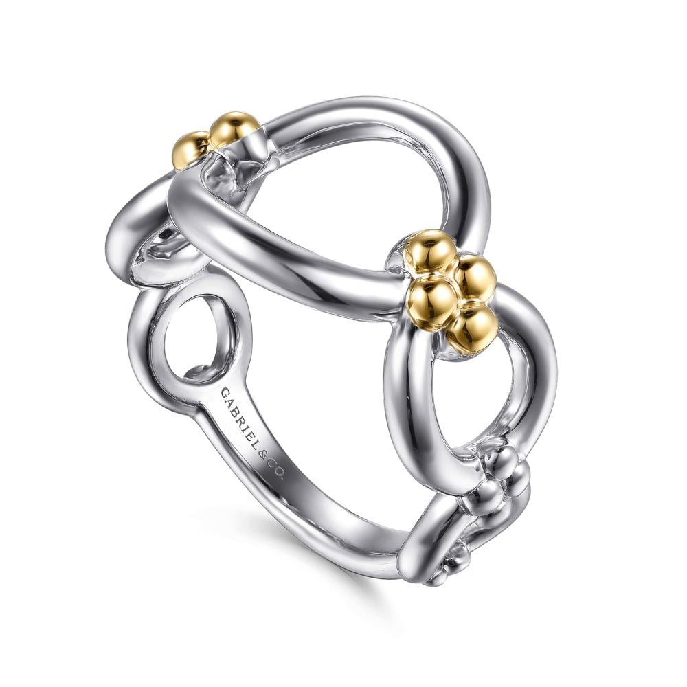 Silver ring with  14 k Yellow gold accents 