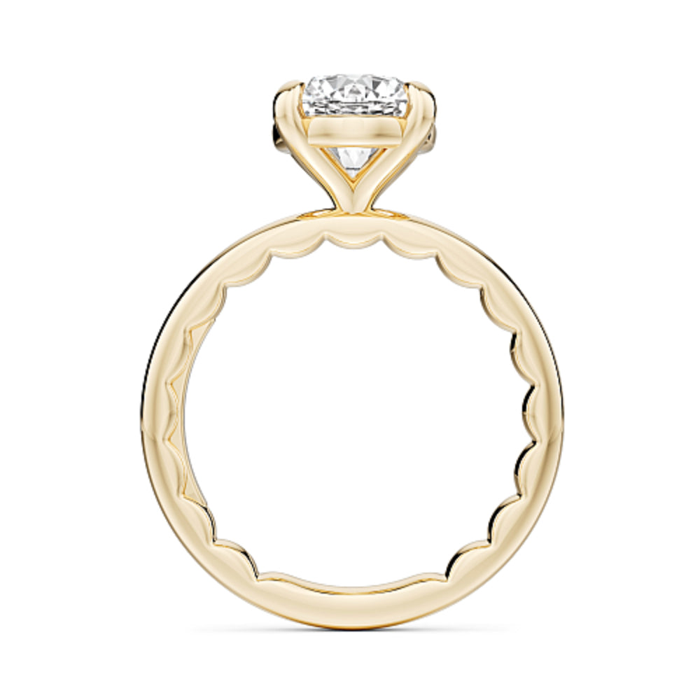 Gold Noam Carver ring with a large round diamond on a white background