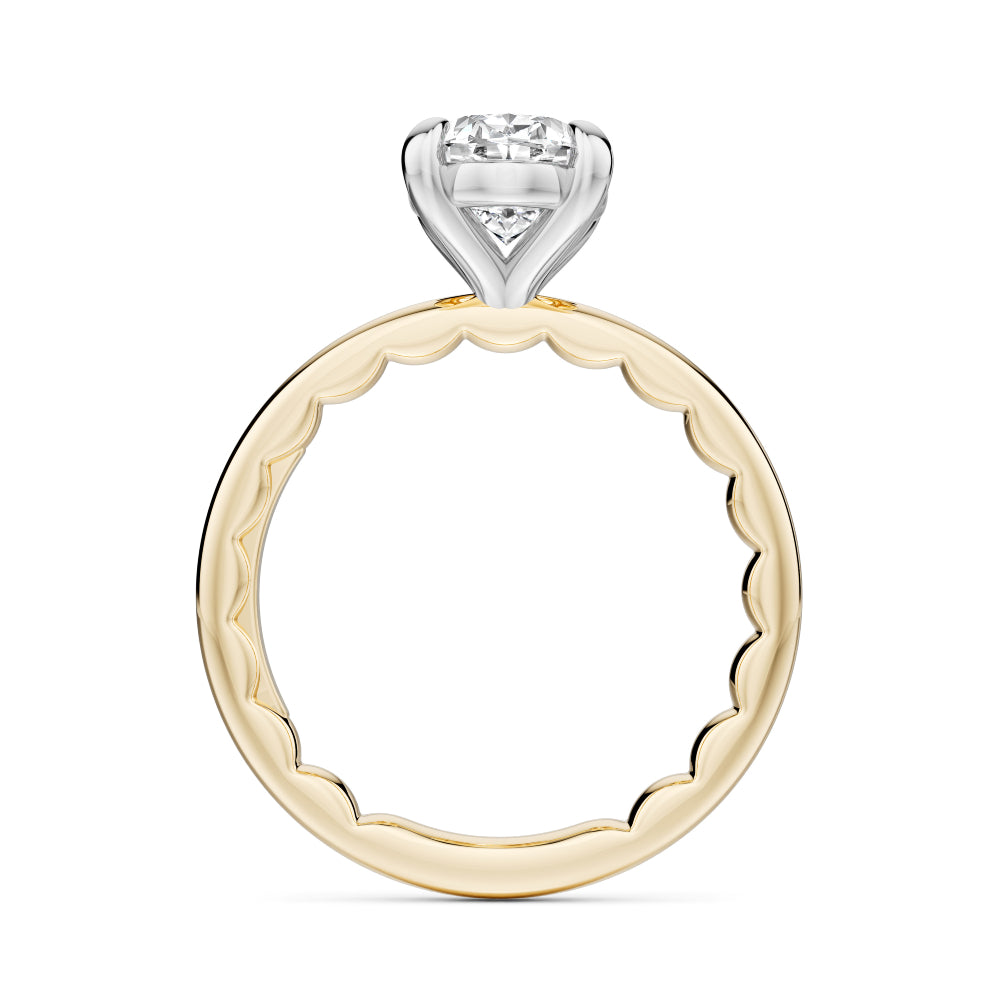 Two-tone gold Noam Carver ring with a large oval diamond on a white background