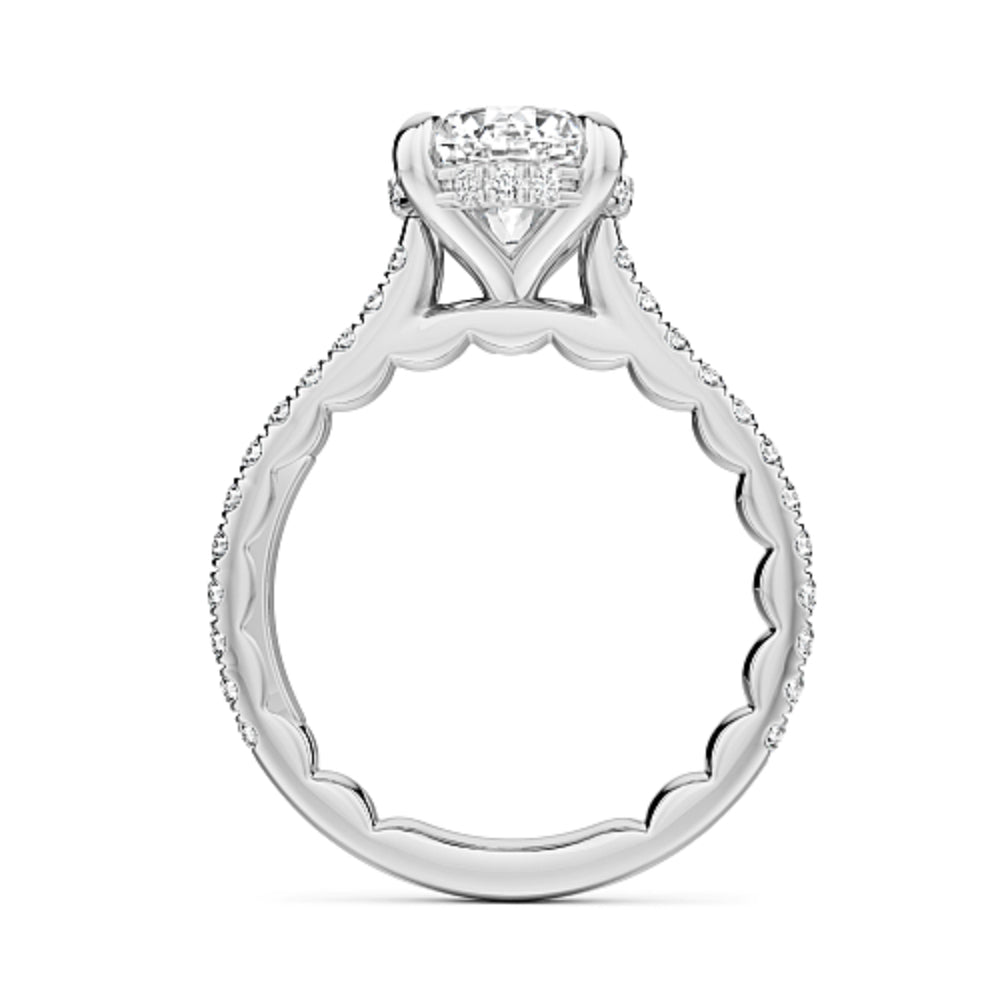 Diamond white gold Noam Carver ring with a round diamond center and diamond sides/hidden halo on a white background