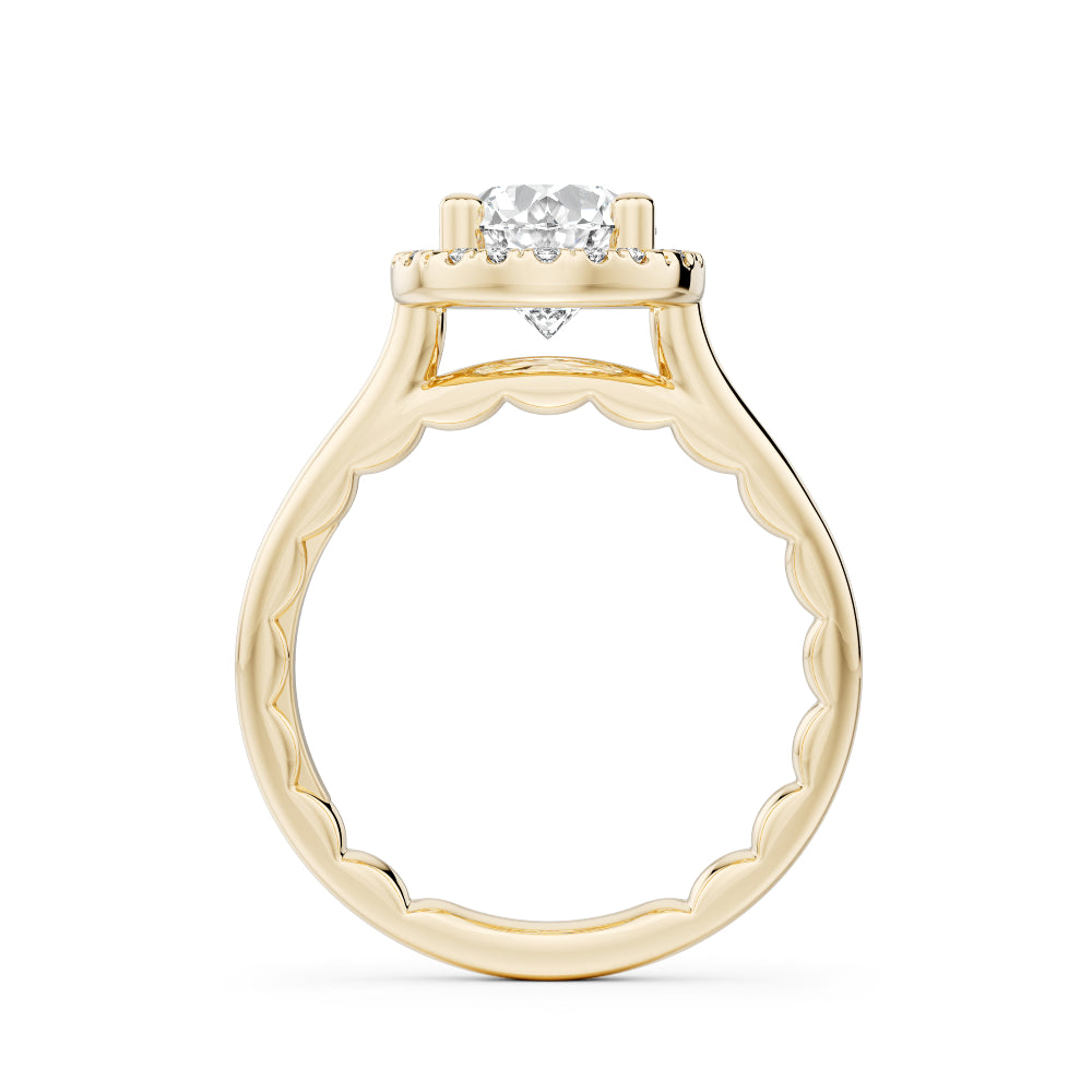 Gold Noam Carver ring with a large oval diamond center and smaller round diamond sides on a white background