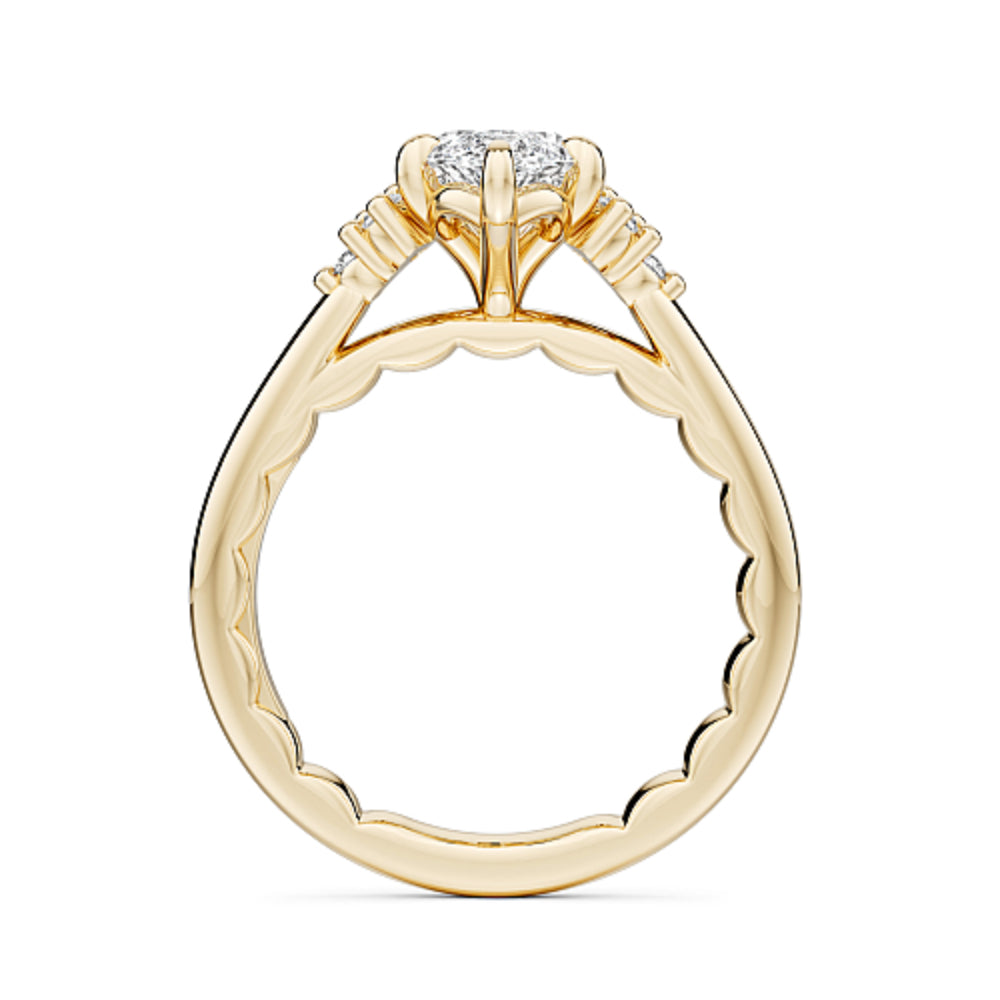 Gold Noam Carver ring with a large marquise diamond and smaller diamonds on a white background