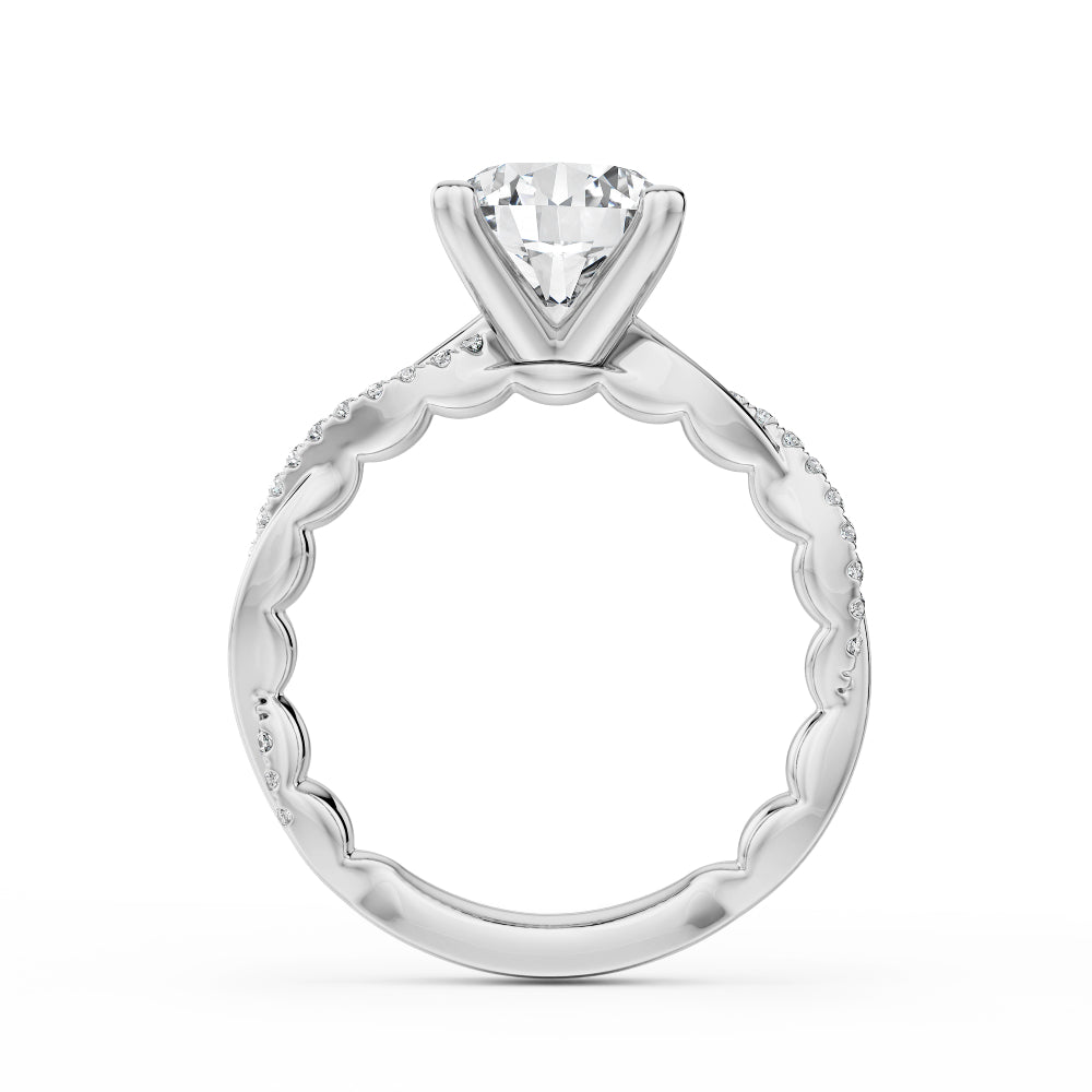 Diamond white gold Noam Carver ring with intricate twist design on a white background