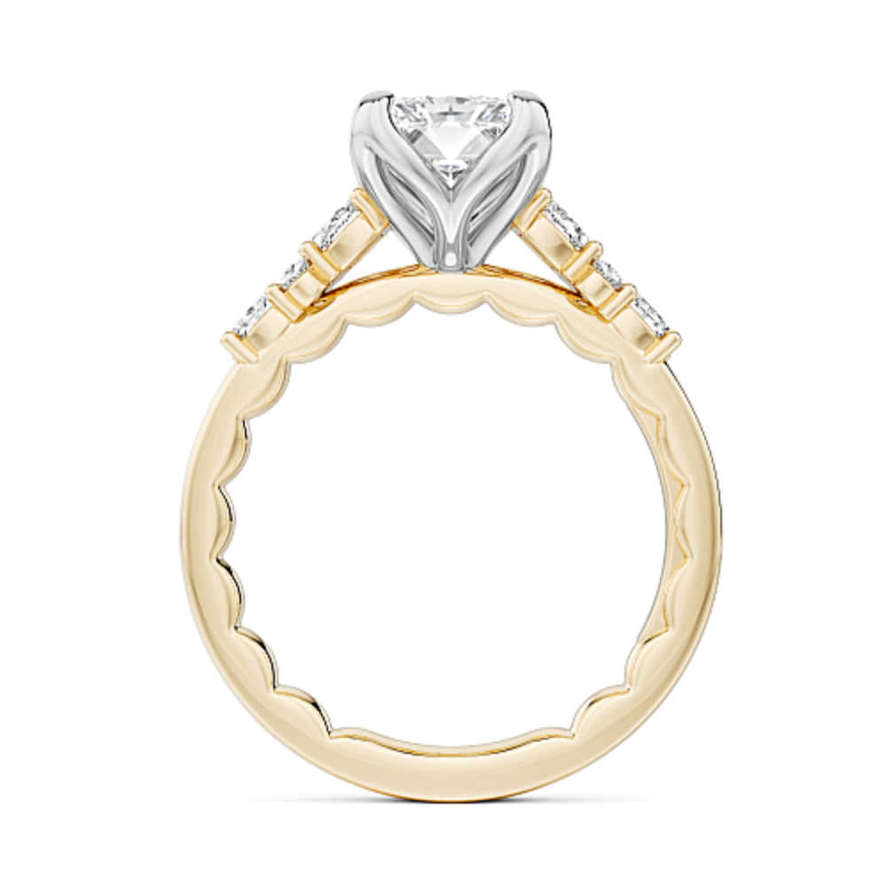 Gold and diamond Noam Carver ring with a radiant cut diamond center on a white background