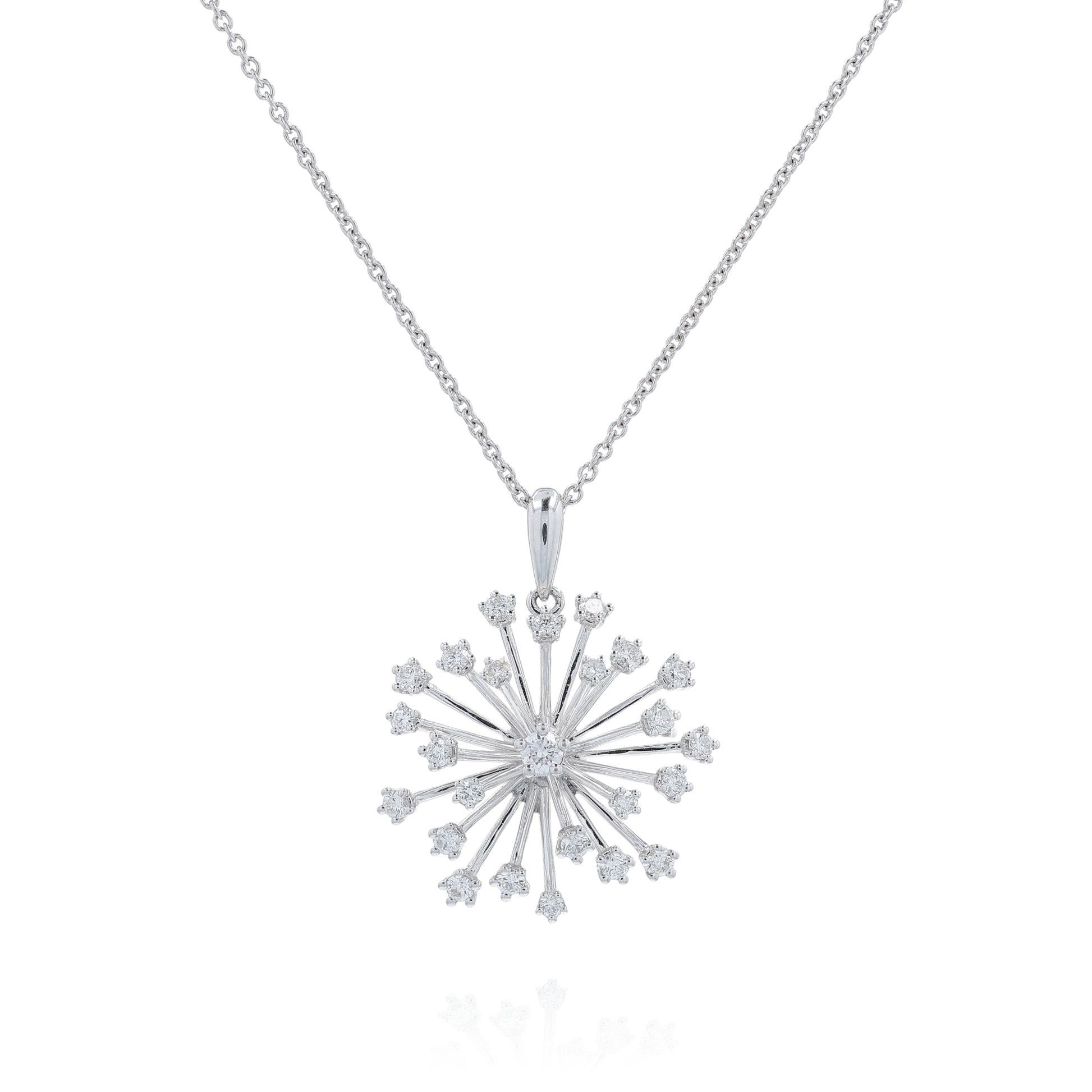 White gold starburst design diamond pendant necklace on a white background