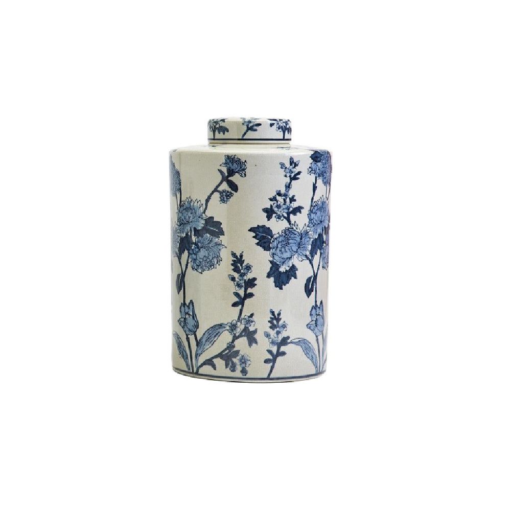 A large cylindrical ceramic canister with a matching lid, decorated with a classic blue floral pattern on a white background, isolated on a white studio background.