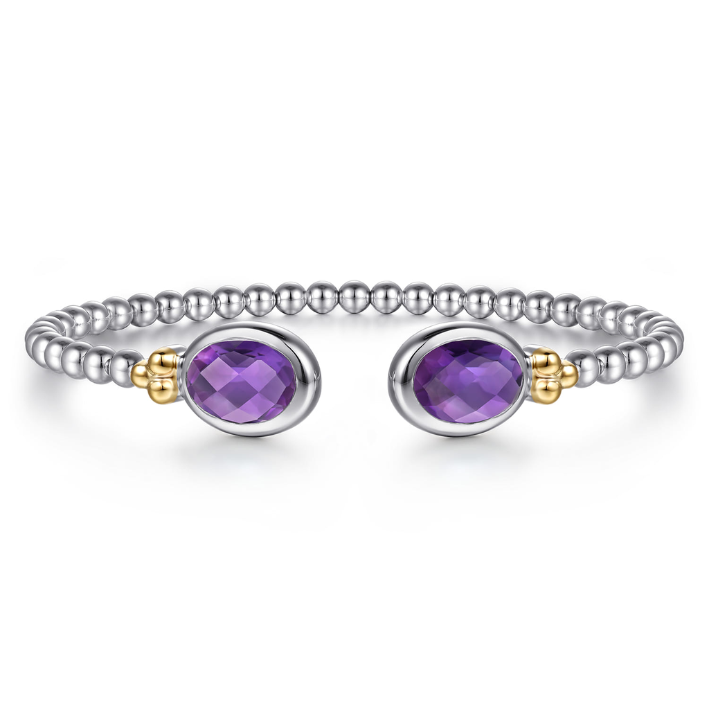 Silver bracelet with purple gemstones on a white background