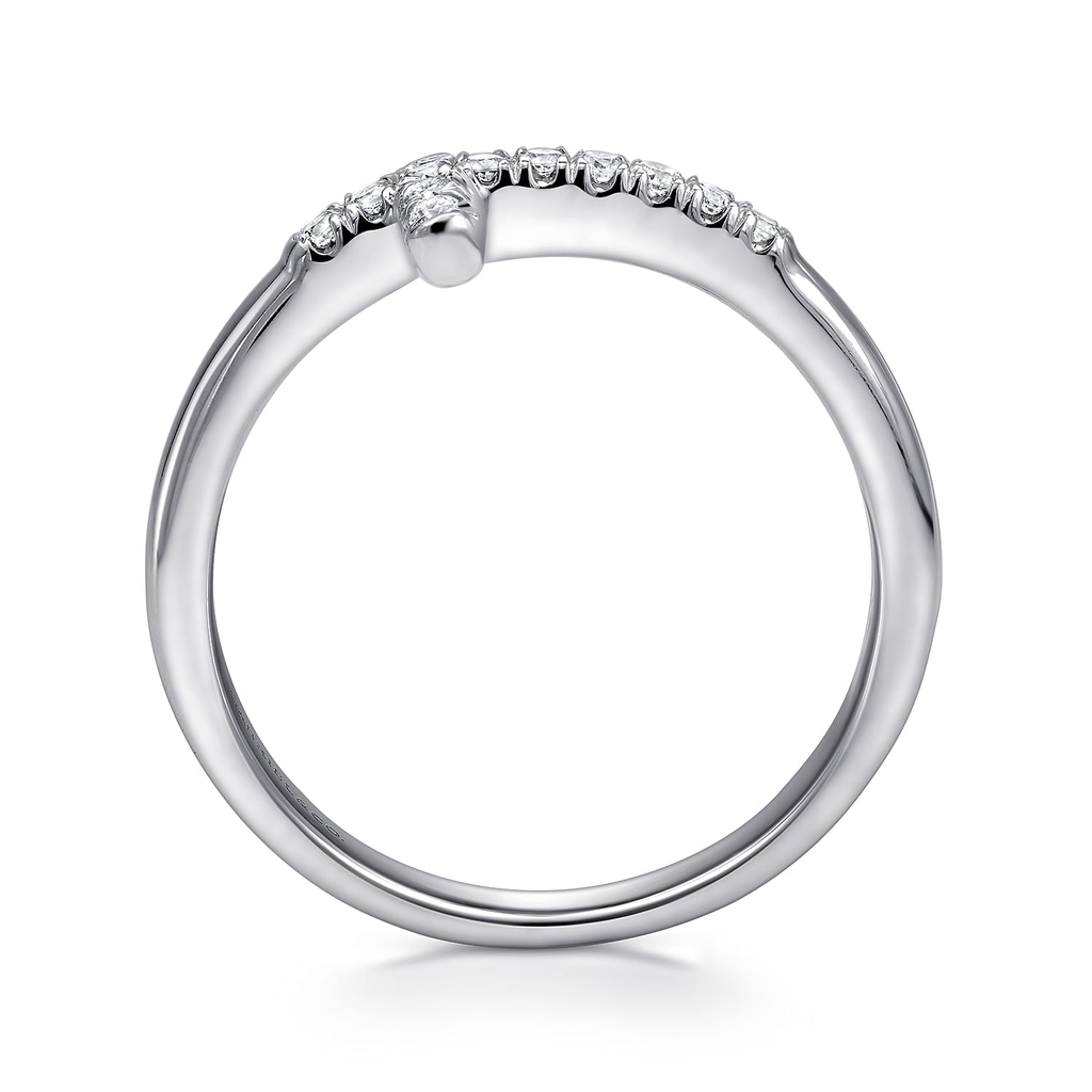 Silver ring with small diamonds on a white background