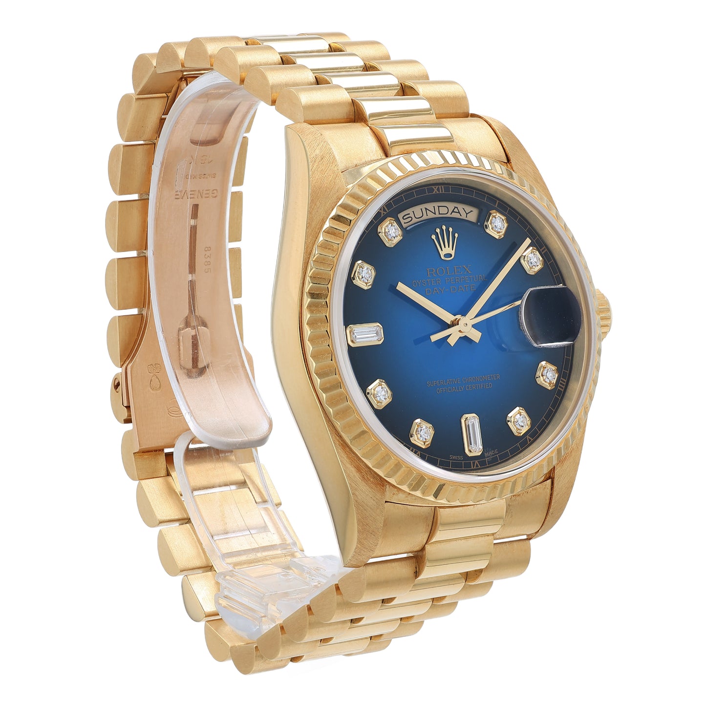 Angle of a yellow gold Rolex watch with a blue dial and diamond indexes on a white background