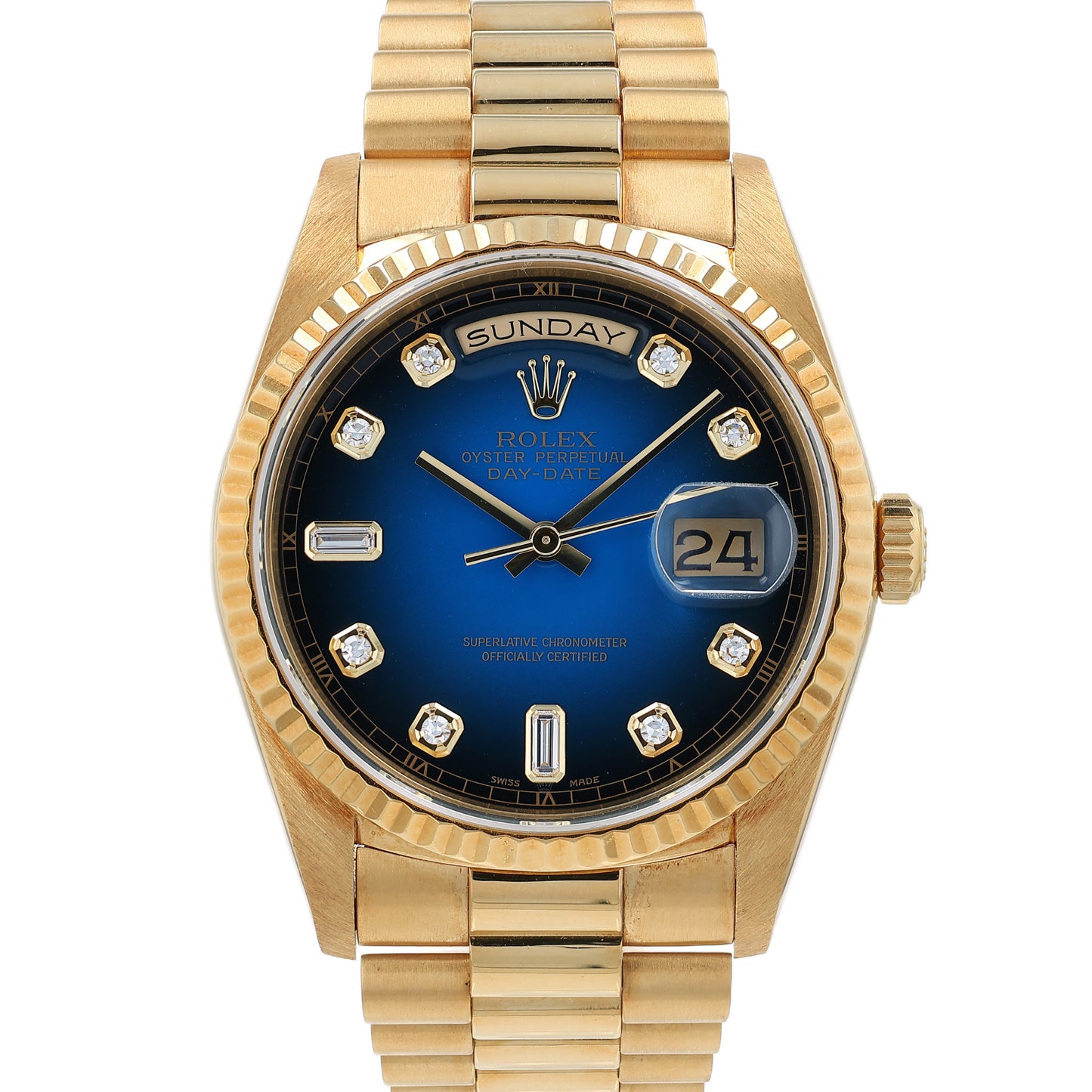 Yellow gold Rolex watch with a blue dial and diamond indexes on a white background
