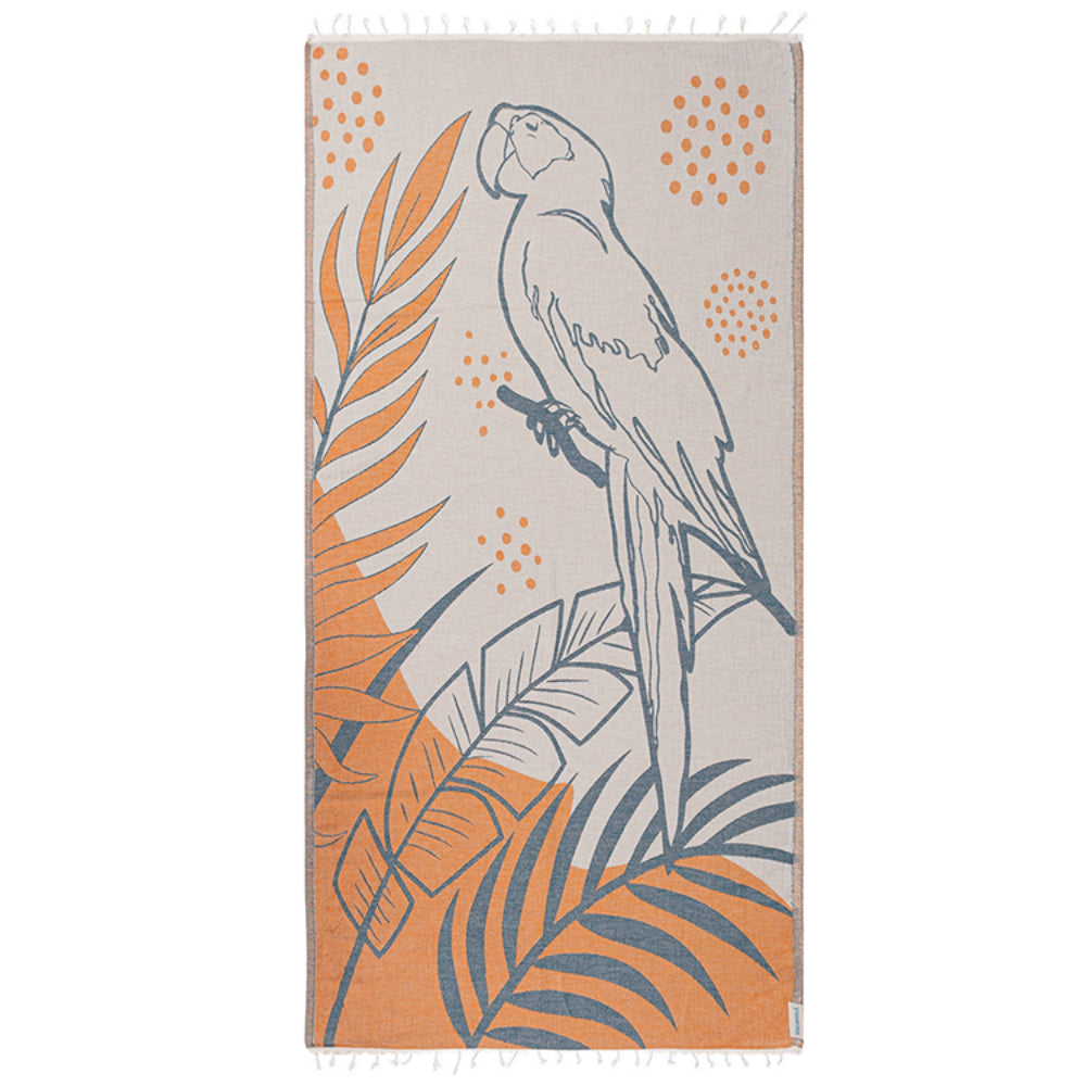 Side two of a orange, blue and grey beach towel with parrot and leaf design and a white tassel edge white on a white background.