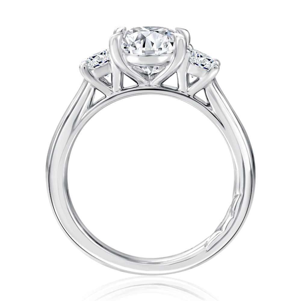 Silver ring with a heart-shaped diamond on a white background