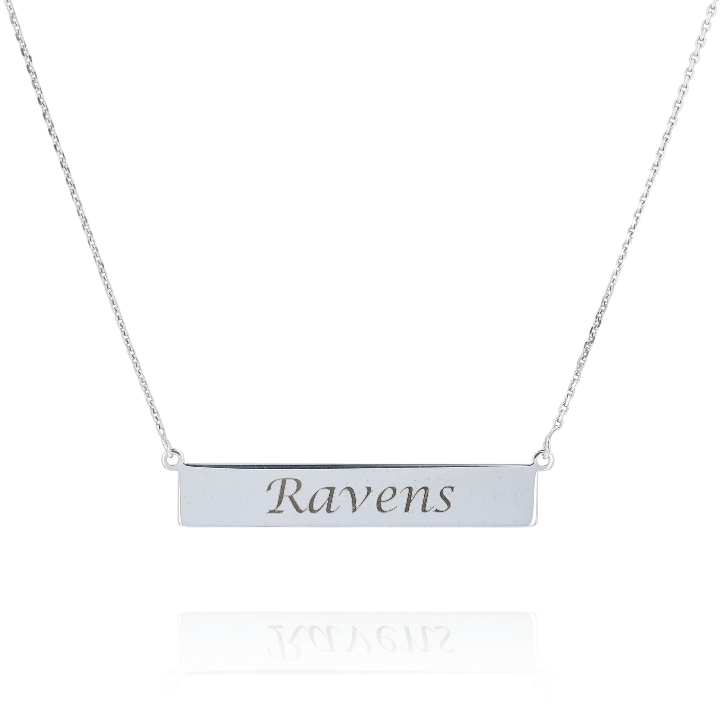 Silver nameplate necklace engraved with the text "Ravens" on a white background