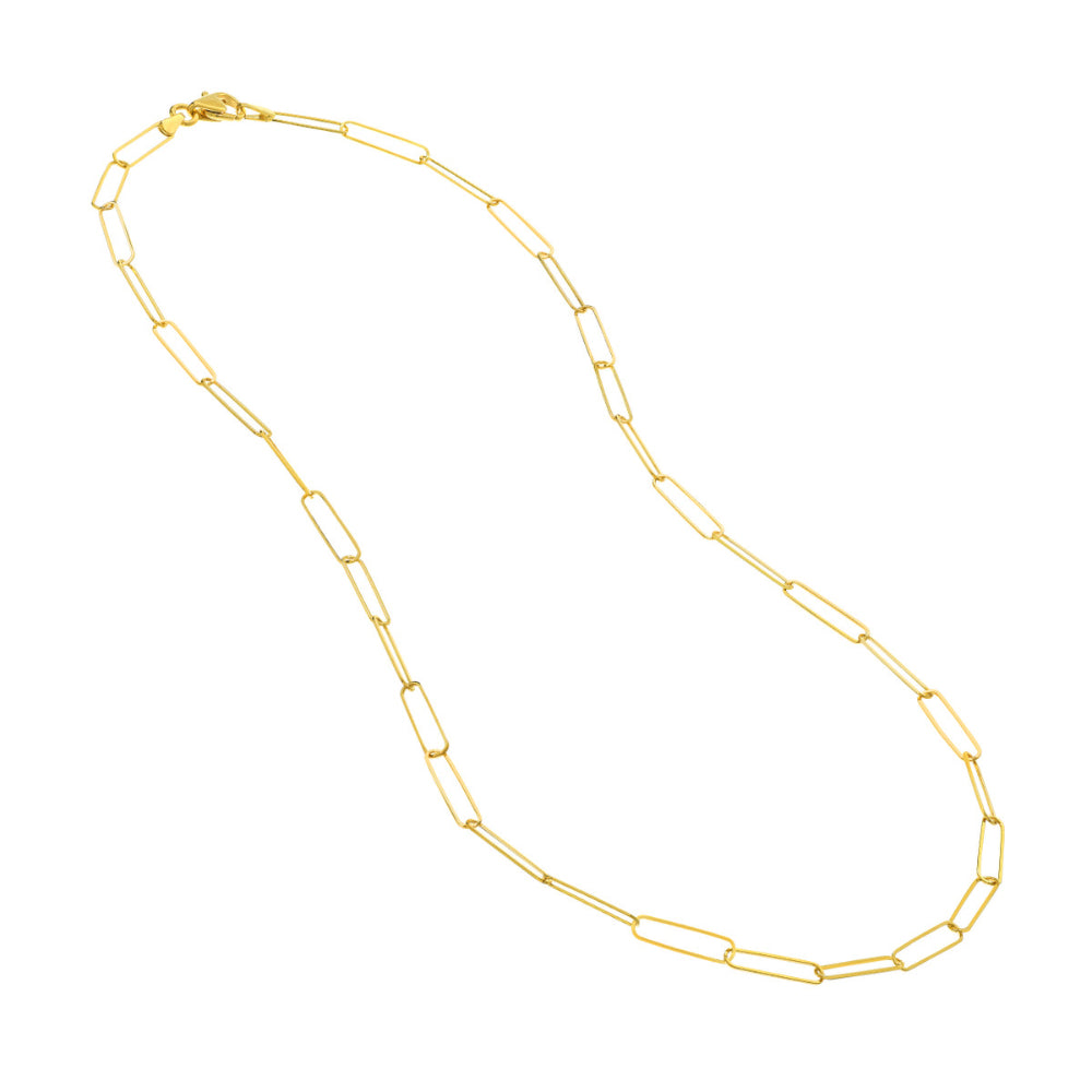 Gold paperclip chain necklace on a white background