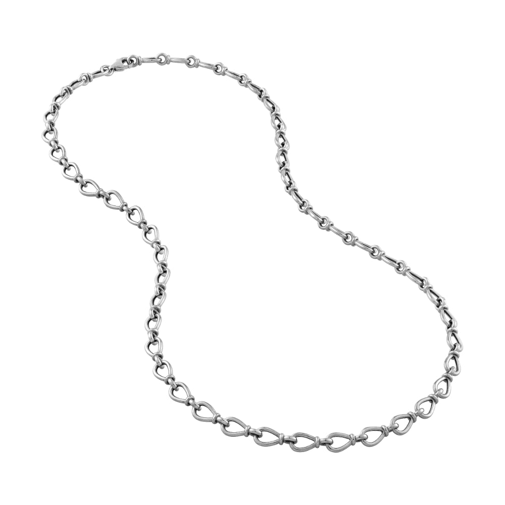silver chain link necklace on white background