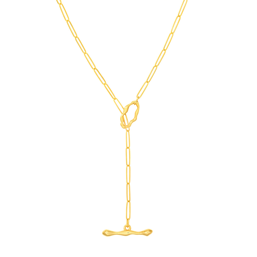 gold tone lariat style necklace on white background