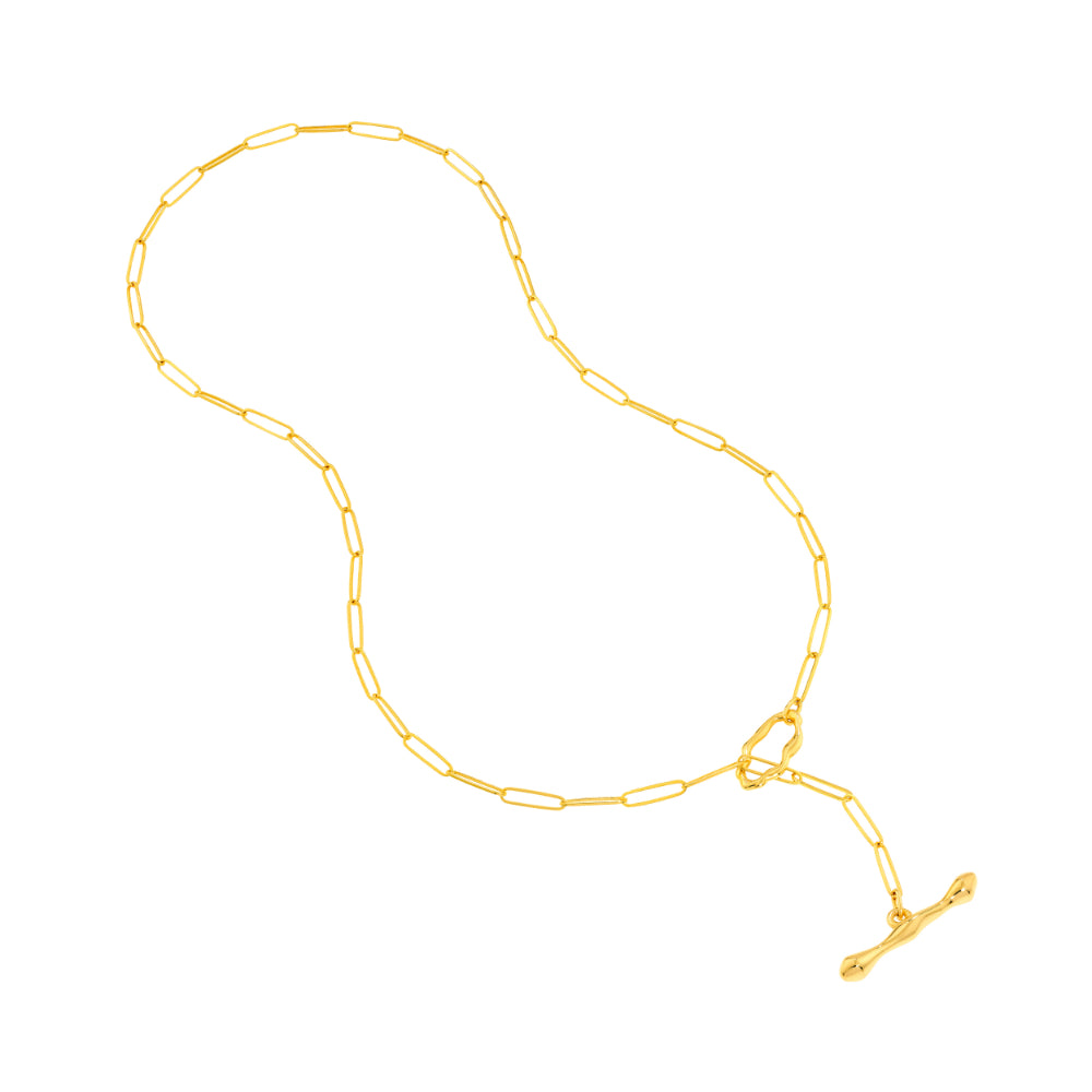 gold tone lariat style necklace flat on white background