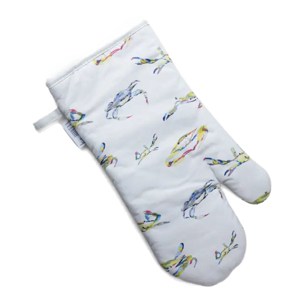 White oven mitt with blue crab designs on a white background.