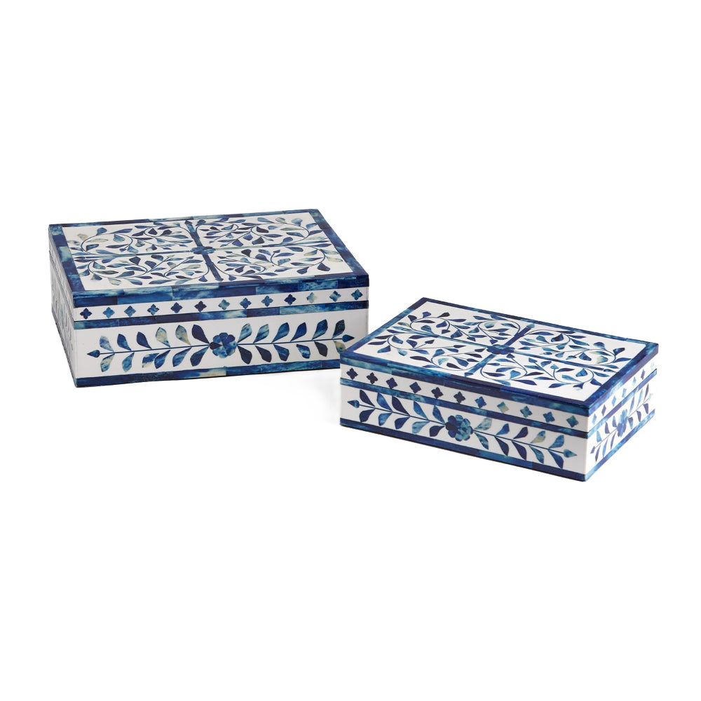 Two rectangular decorative boxes with white backgrounds and intricate blue floral and geometric patterns, shown on a plain white studio background.