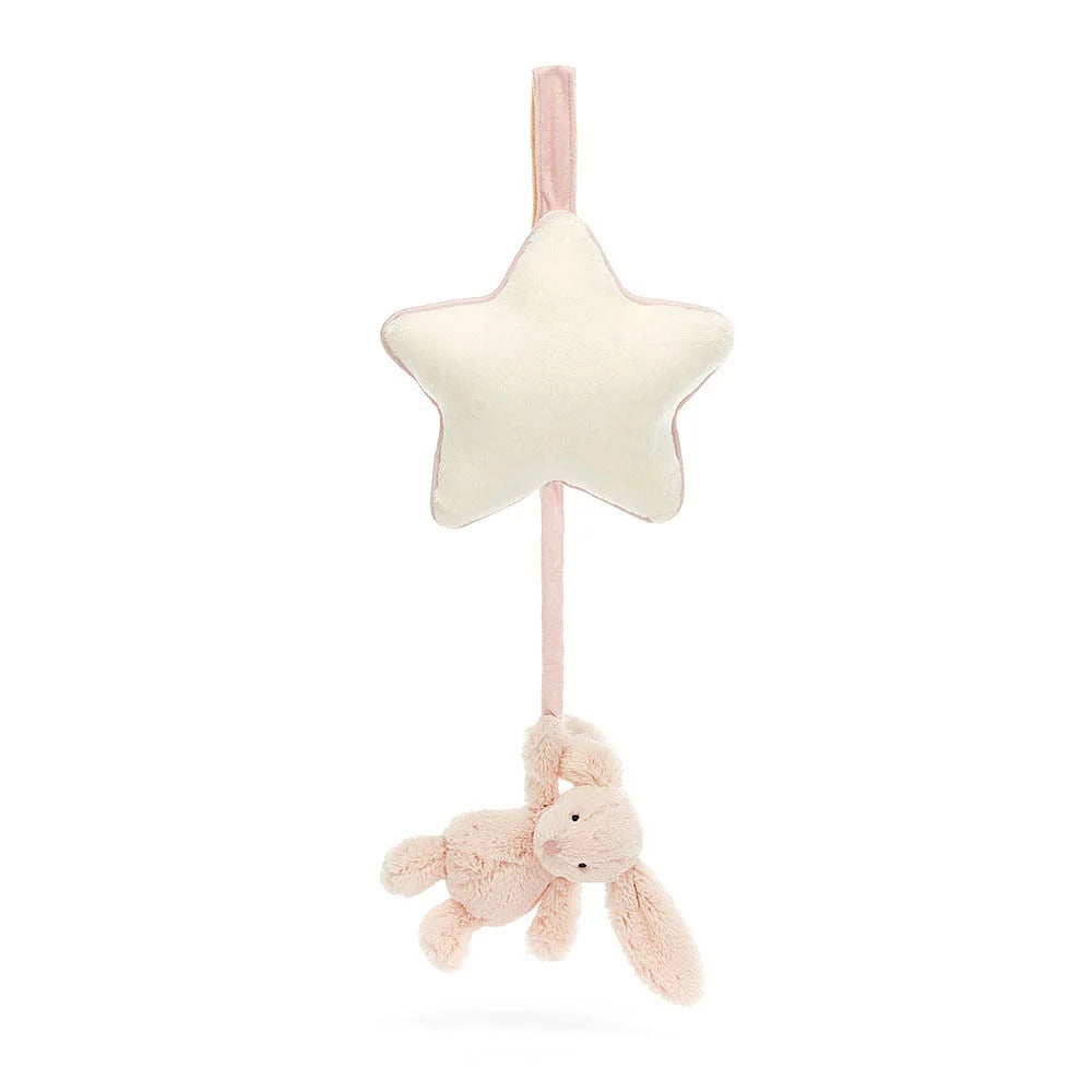 White star-shaped plush toy with a pink bunny at the on a string bottom on a white background.