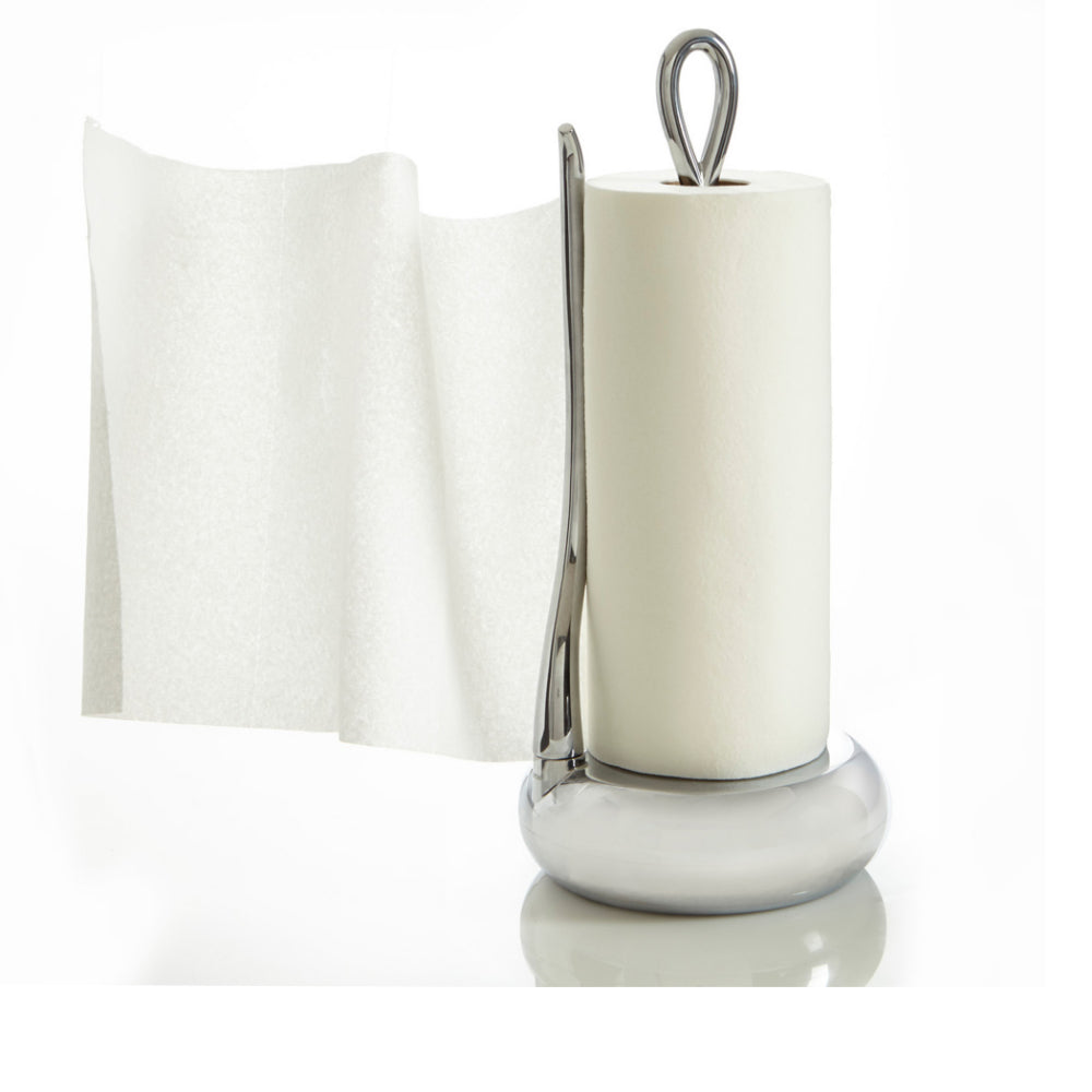 Wooden and silver metal alloy paper towel holder with paper towels on a white backround 