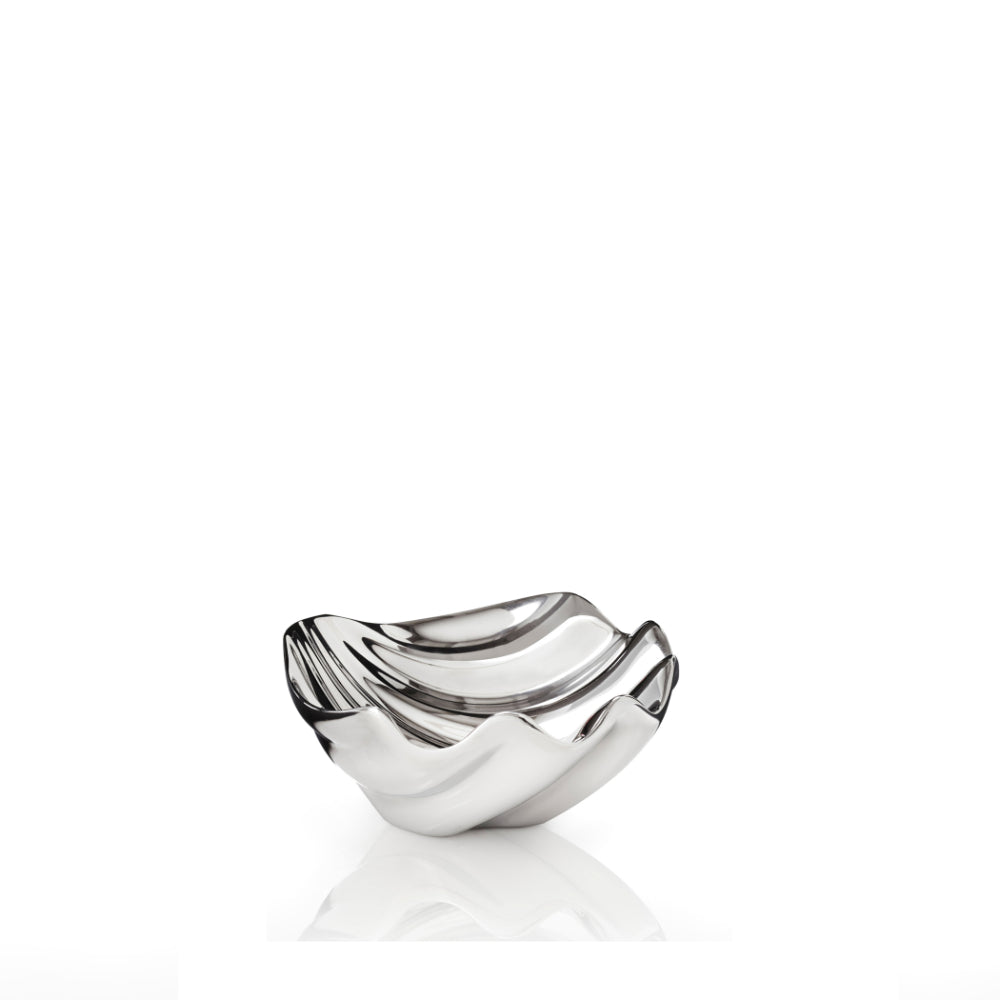 Silver bowl with wavy design on a white background
