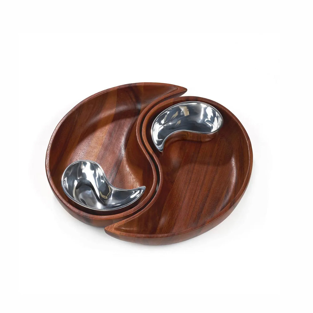 A top photo of the brown wooden yin yang chip dip bowl set with with silver metal bowls on a white background
