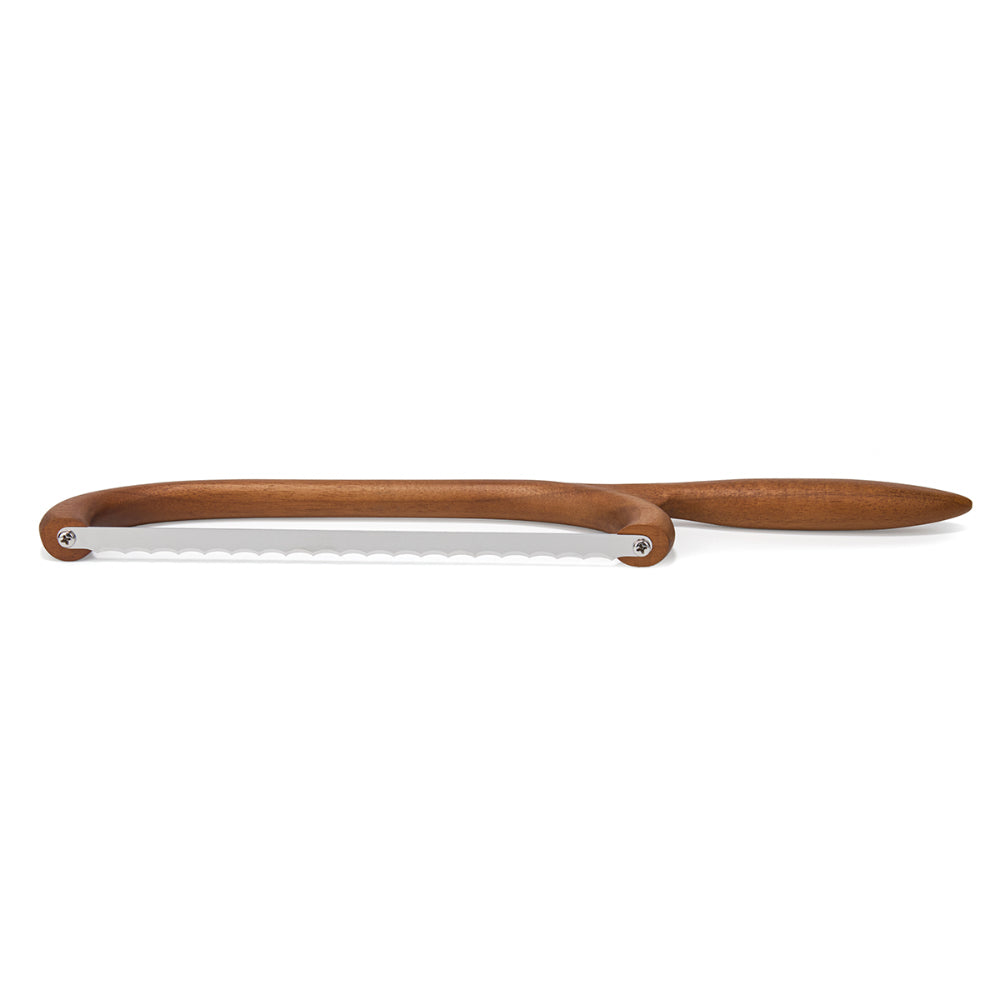 Wooden bread saw straightener on a white background