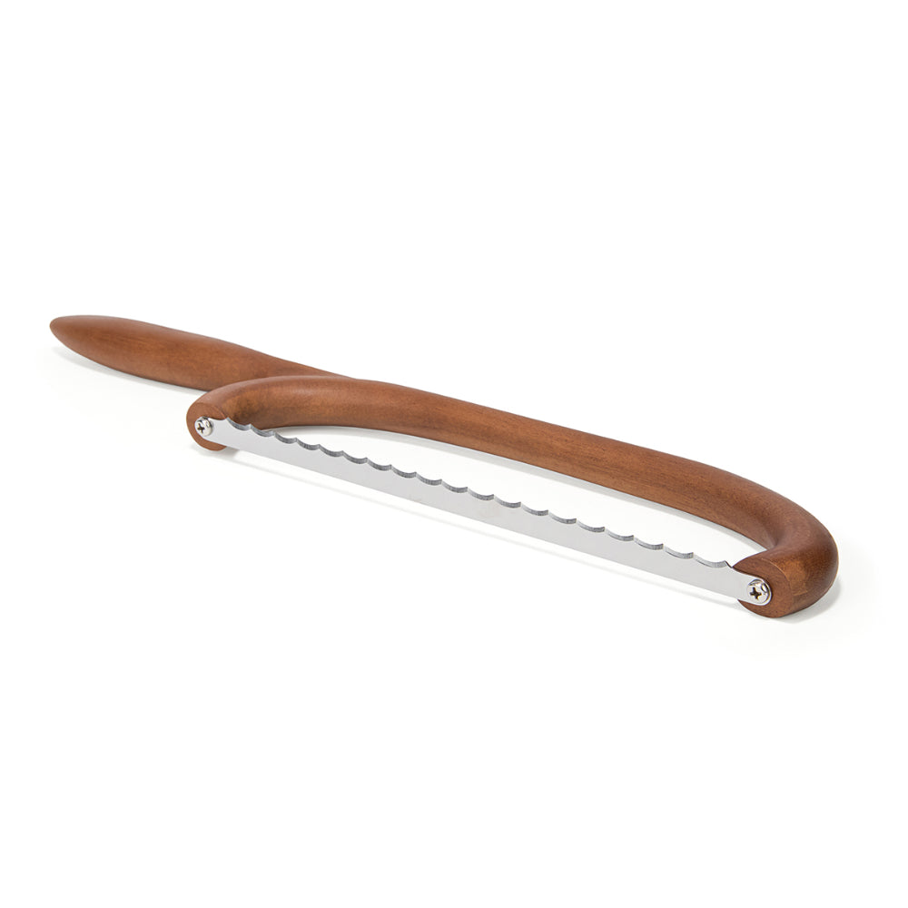 Wooden-handled metal tool on a white background