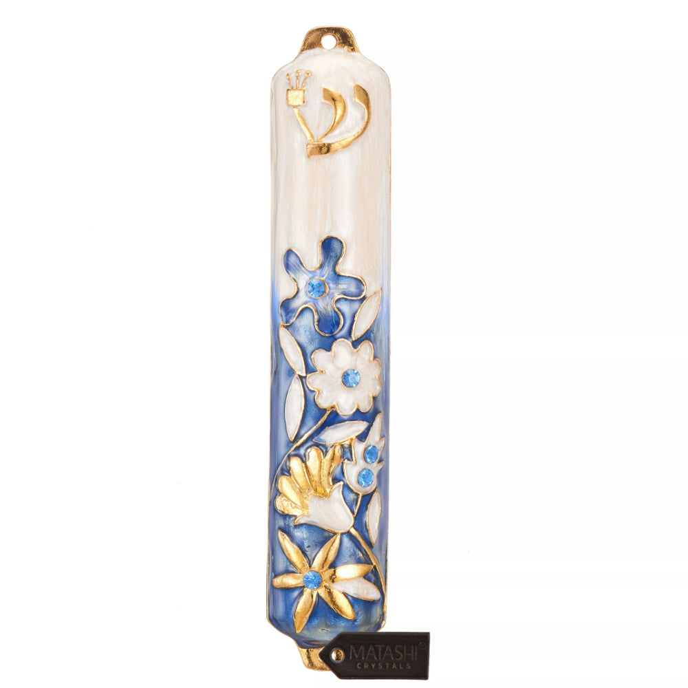 Decorative mezzuzah with floral patterns on a white background