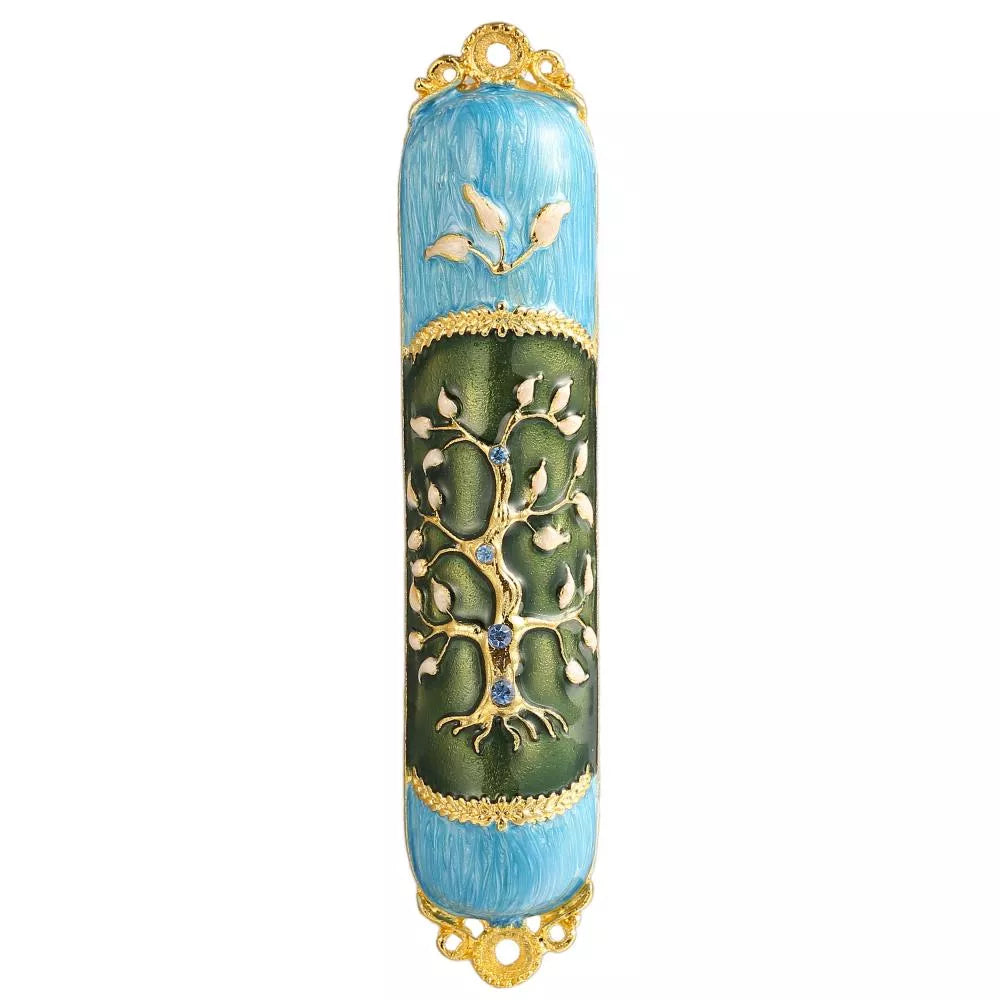 Decorative mezzuzah with tree of life design on a white background