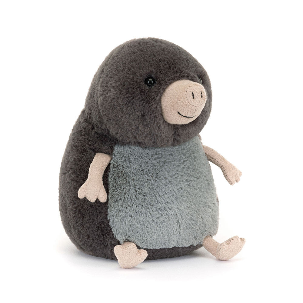 Plush toy mole on a white background