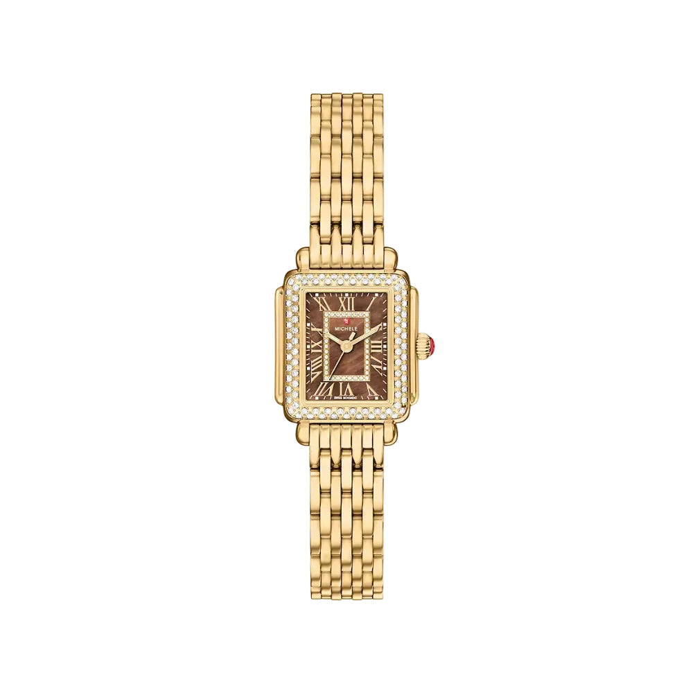 A gold-tone rectangular watch with a brown dial, Roman numeral hour markers, a bezel-set crystal pavé, and a matching gold-tone link bracelet, shown against a plain light background.