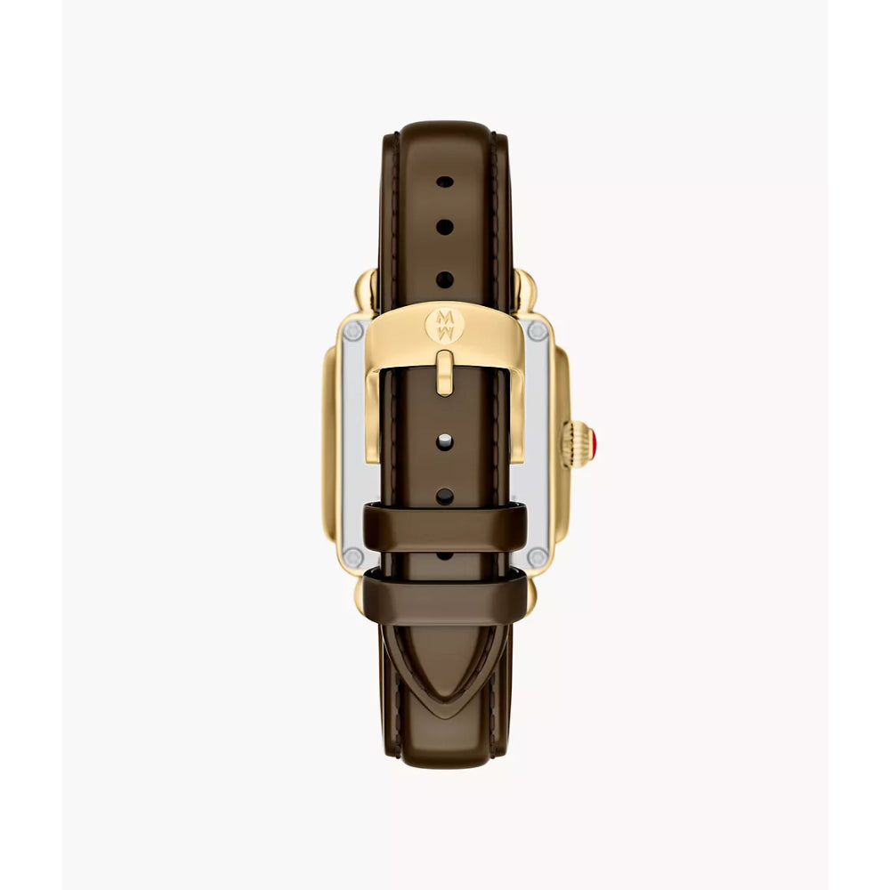 A top-down view of a watch with a dark brown leather strap and a gold-tone case, shown against a plain white background.