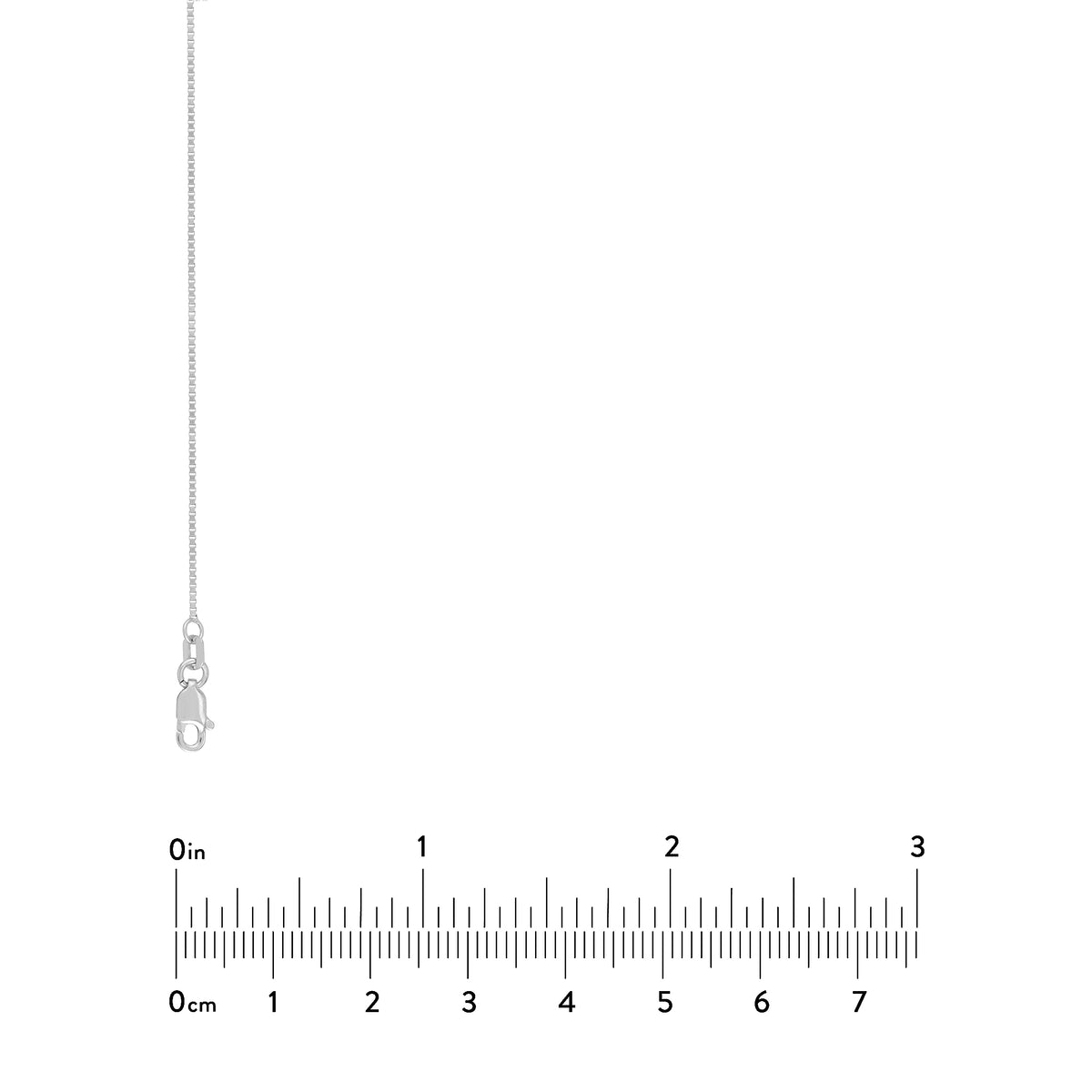 Silver necklace with clasp and chain on a white background with a ruler for scale.