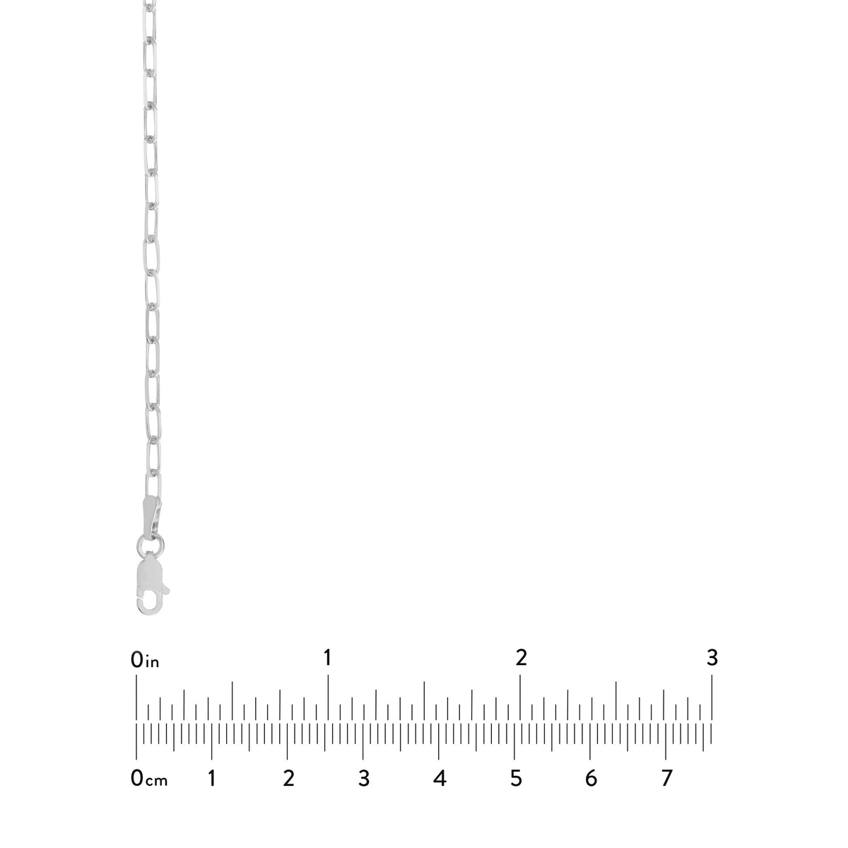 Silver chain with a ruler for scale on a white background