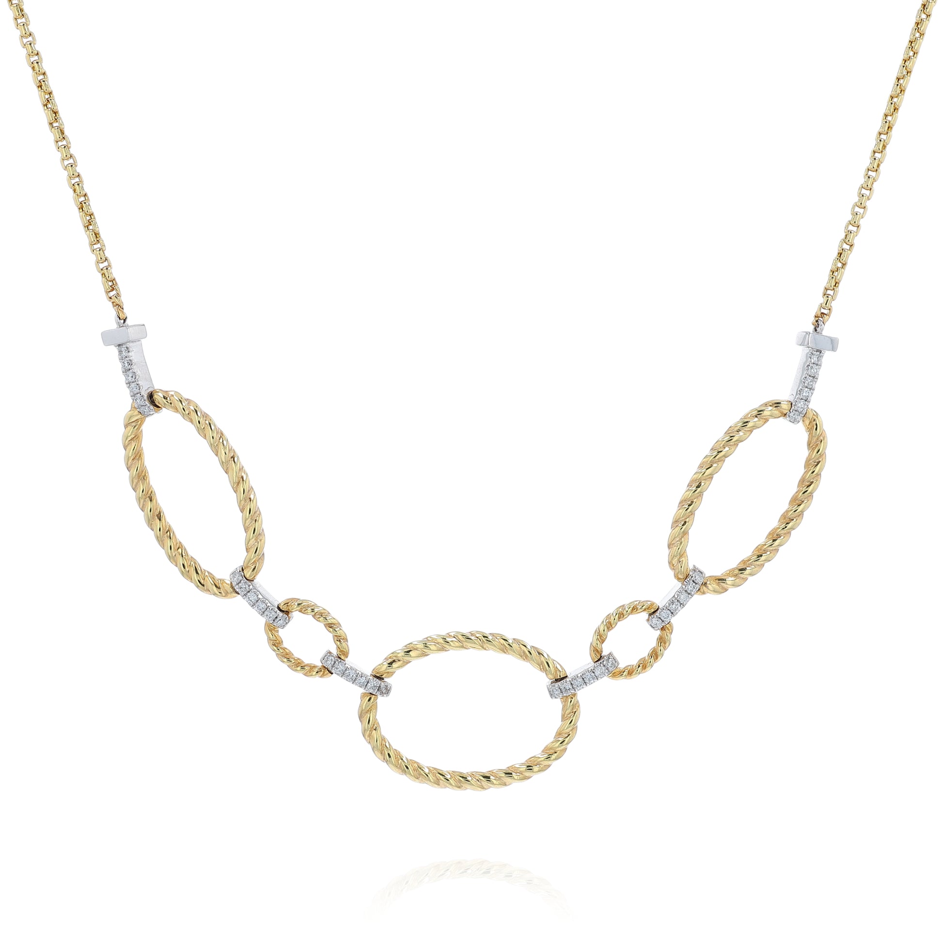 Yellow gold open oval twist link and pave diamond bar necklace on a white background