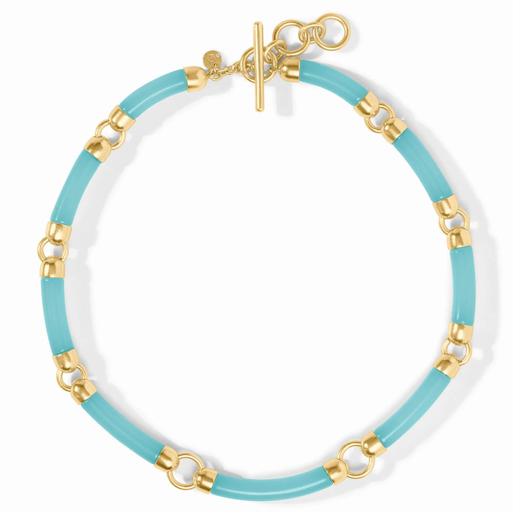 Bracelet with blue and gold links on a white background