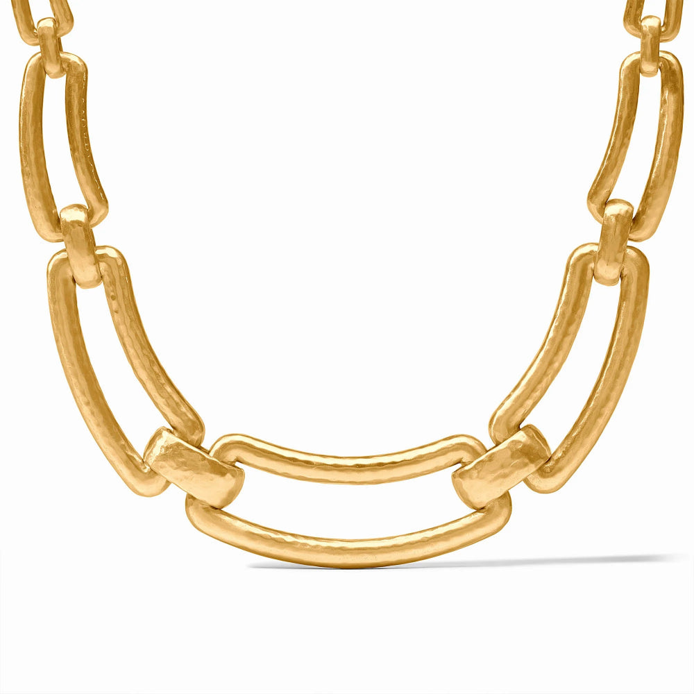Gold chain necklace on a white background
