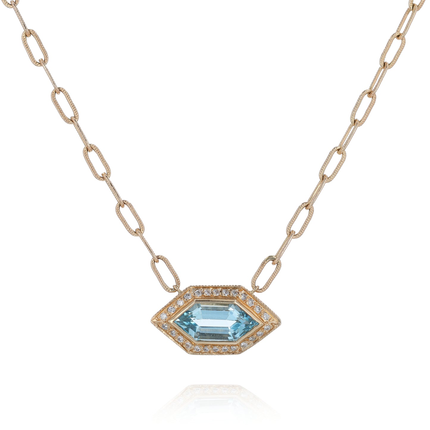 Yellow gold marquise shape aquamarine and diamond halo pendant necklace on a white background