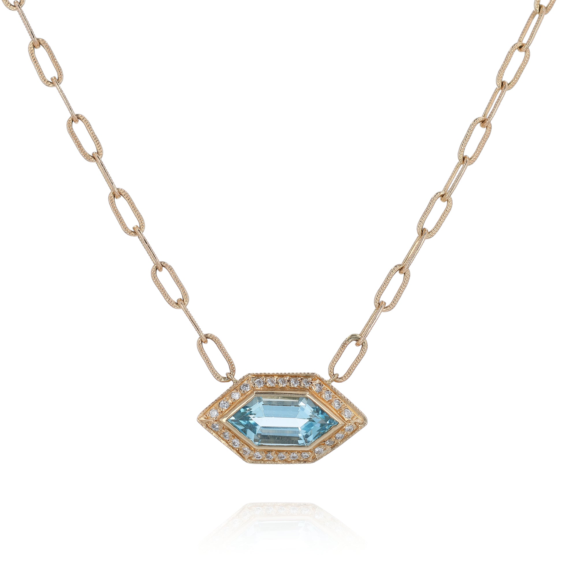 Yellow gold marquise shape aquamarine and diamond halo pendant necklace on a white background