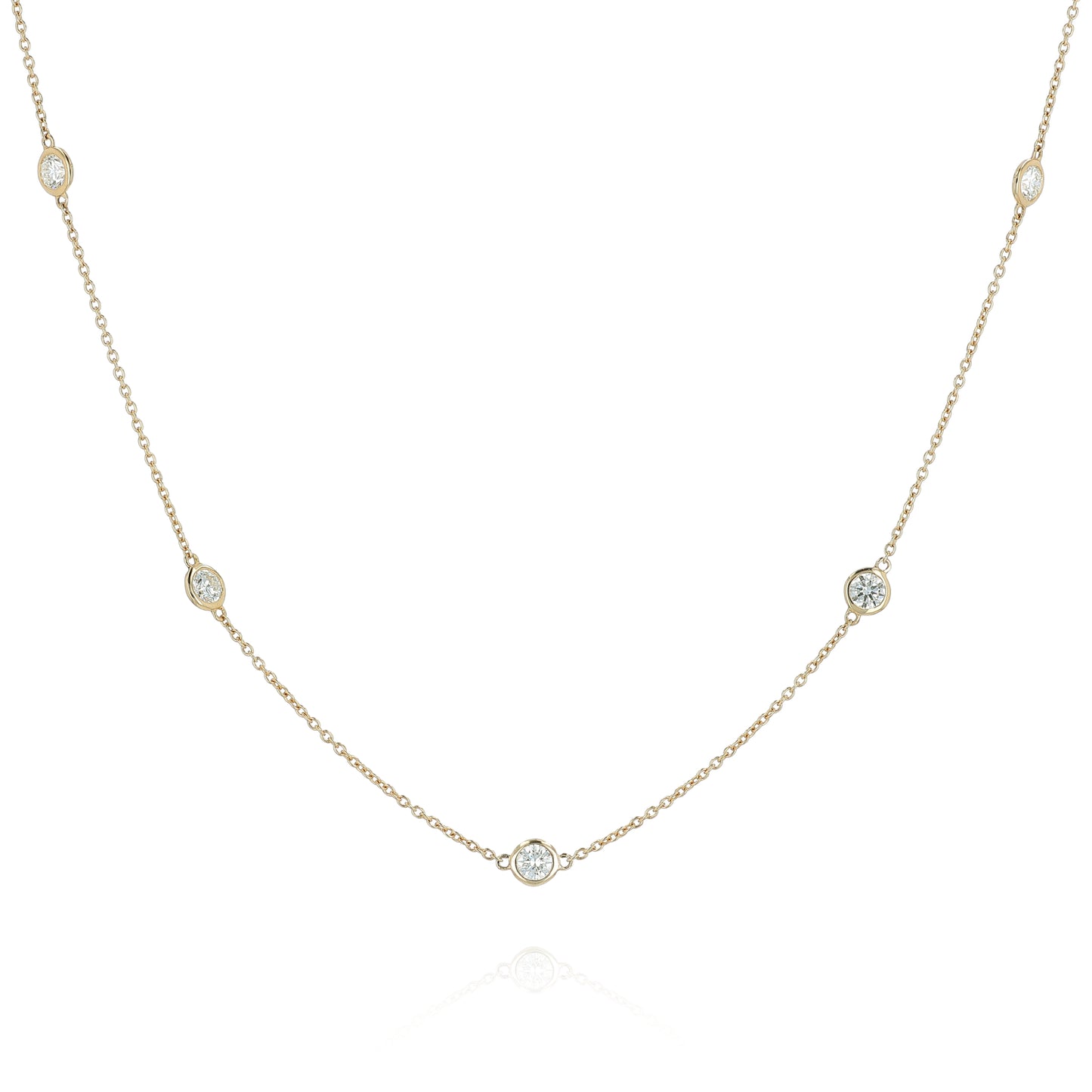 Yellow gold Diamonds By The Yard diamond station necklace on a white background