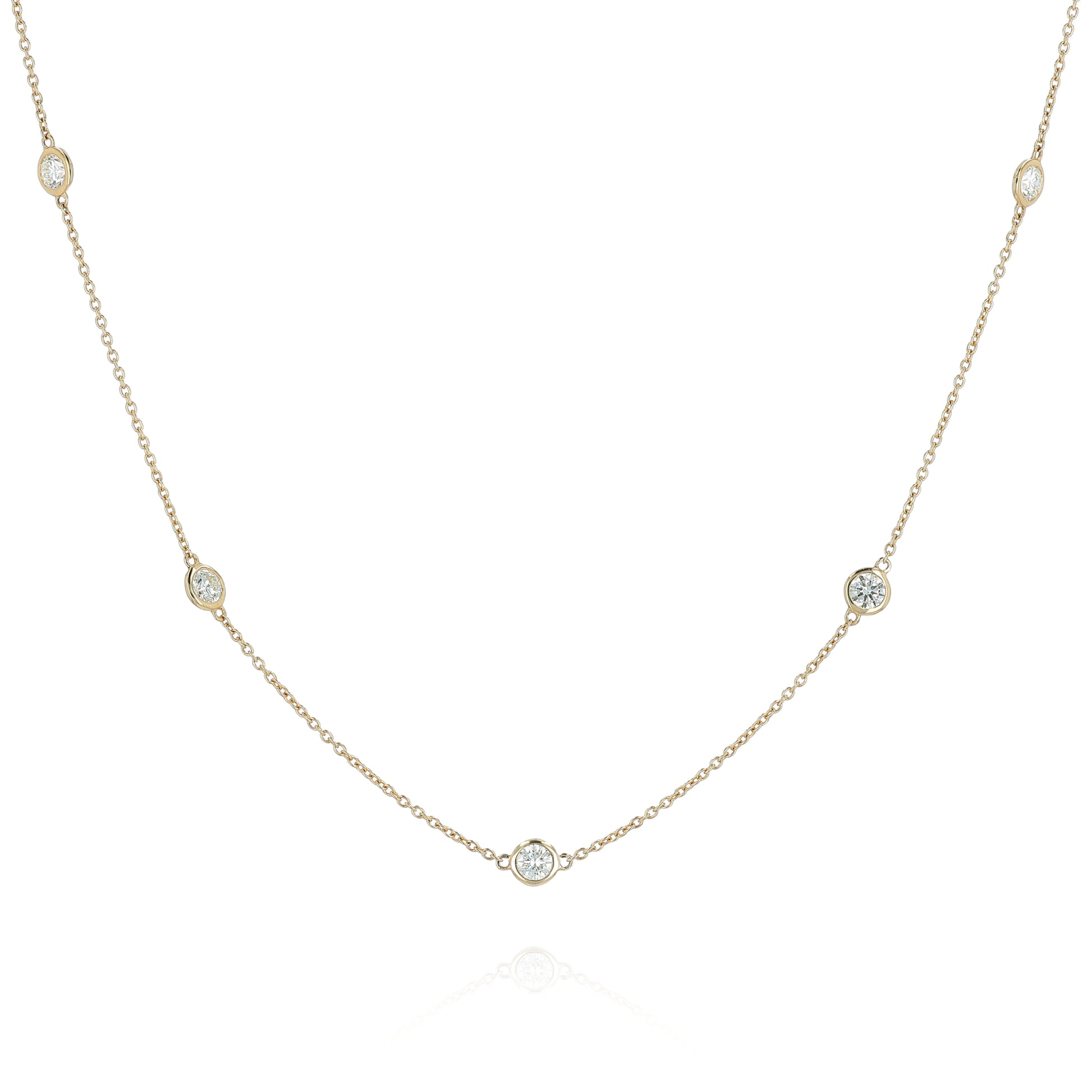 Yellow gold Diamonds By The Yard diamond station necklace on a white background