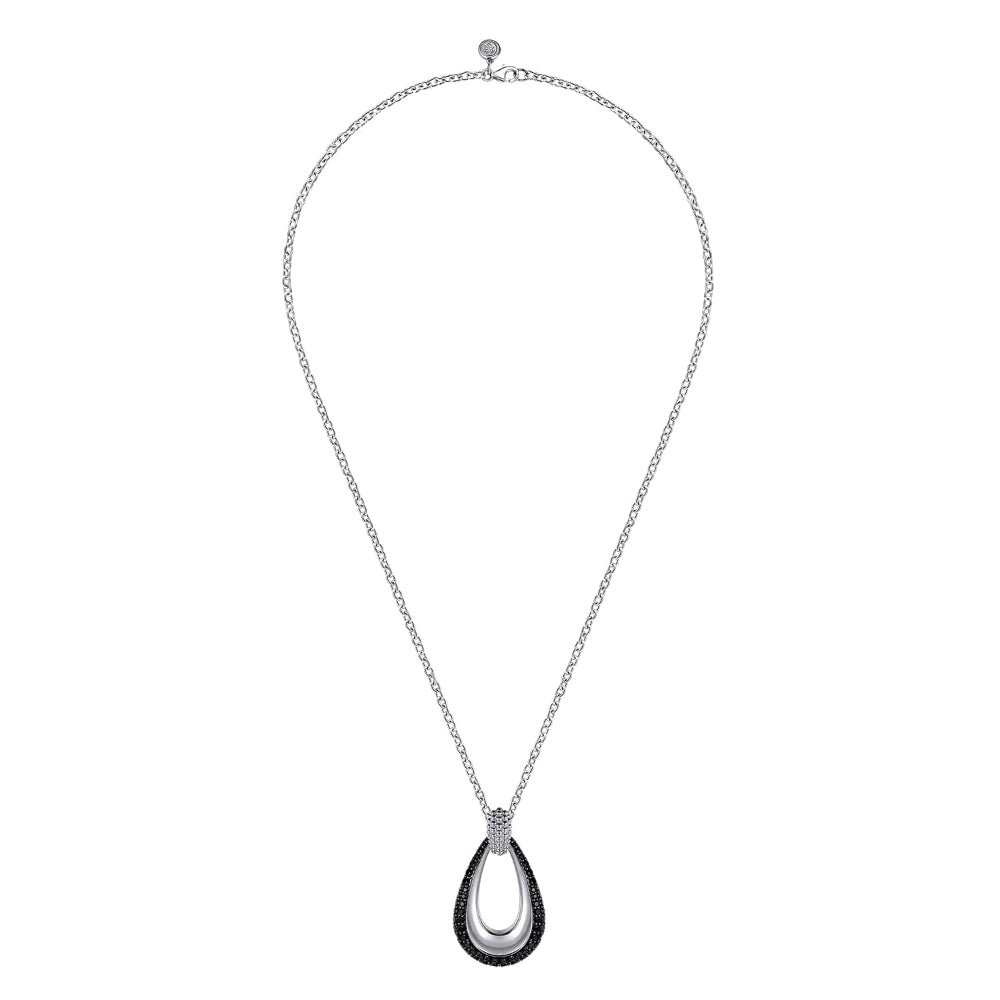 A silver teardrop pendant necklace featuring a Black Spinel pave teardrop on silver chain 