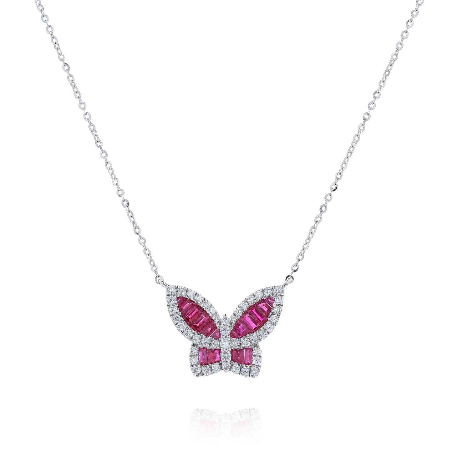 White Gold ruby and diamond butterfly pendant necklace on a white background