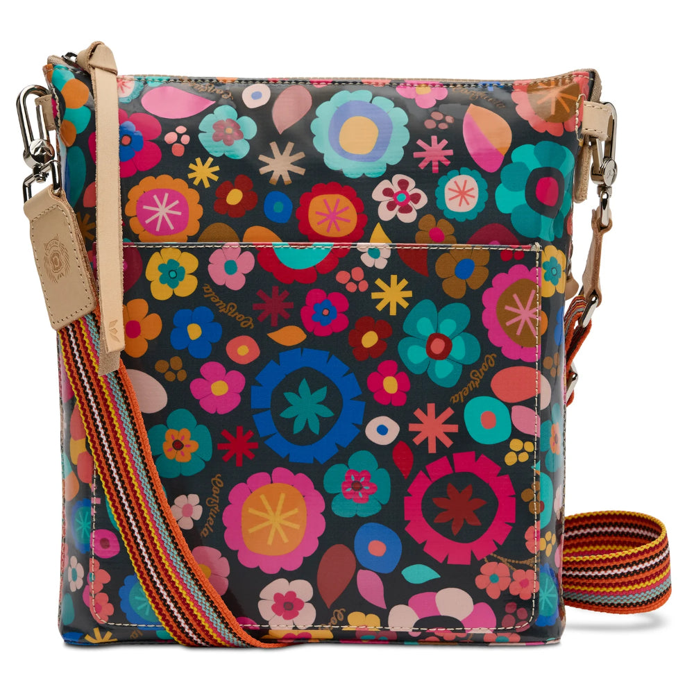 Colorful floral-patterned handbag with a strap on a white background